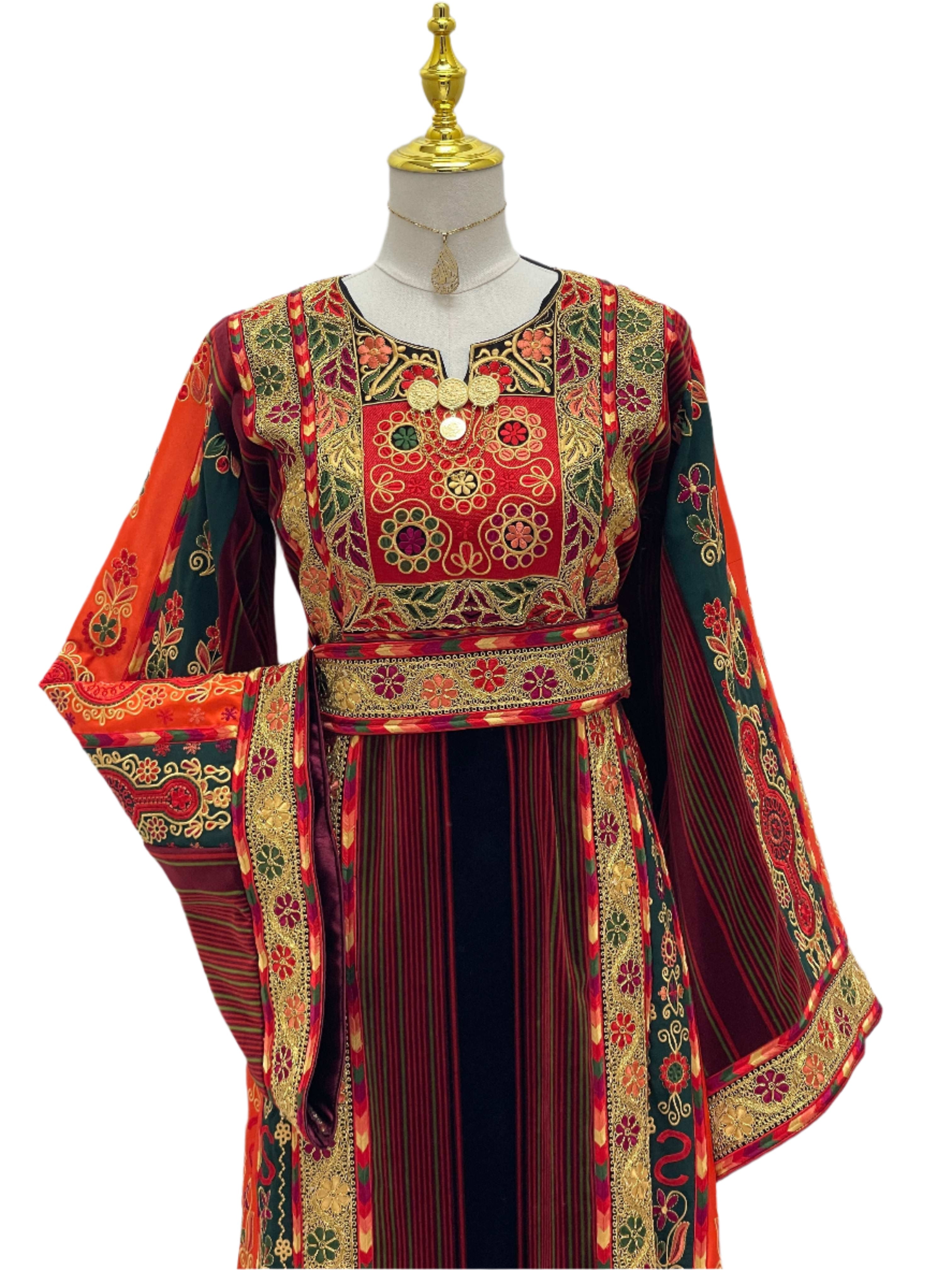 Palestinian Elegance embroidered Janna & Nar Malaka Kasab Thoub with vibrant red green floral patterns