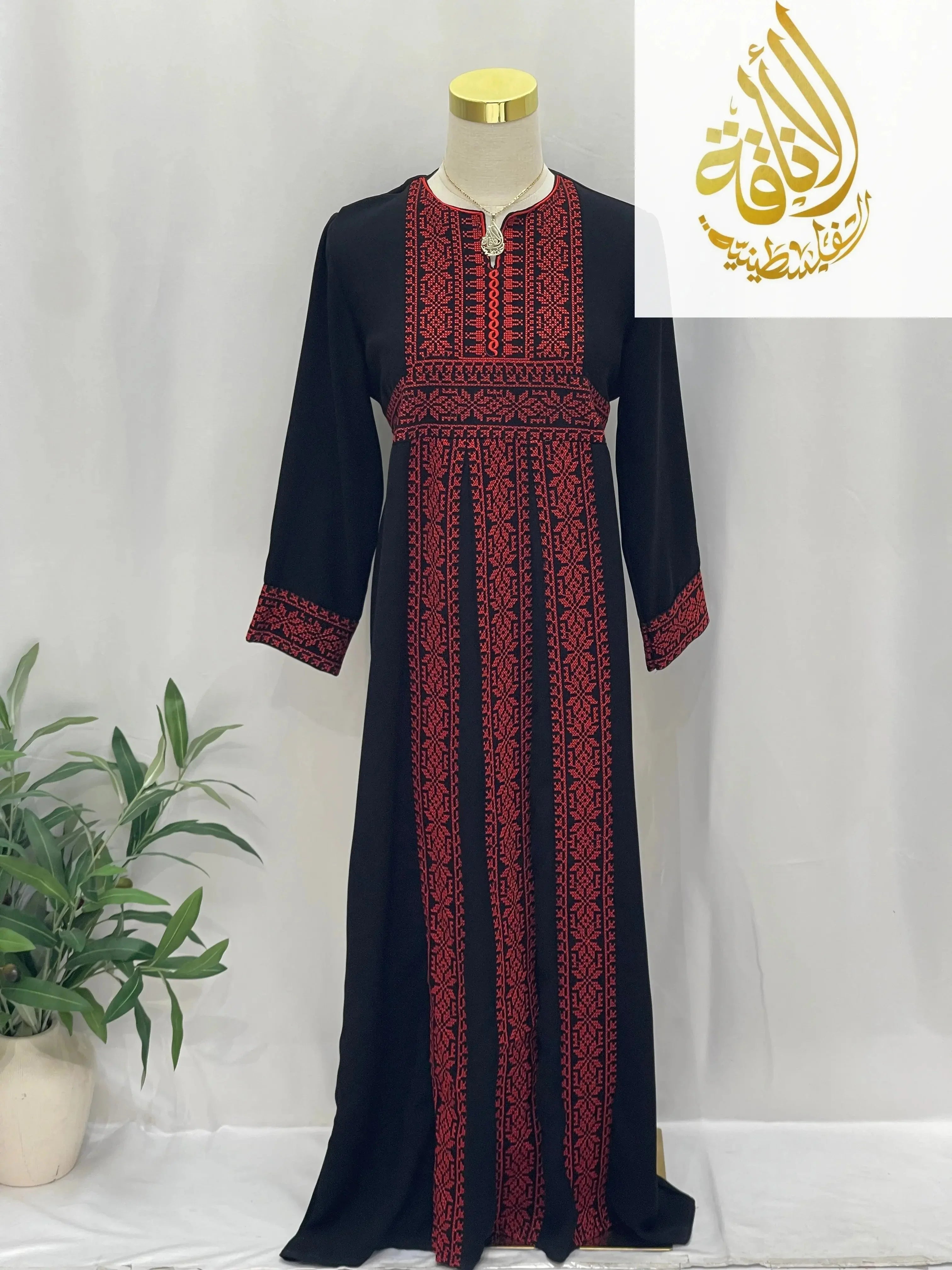 Palestinian Elegance kid's Haya Embroidered Abaya in black with red traditional embroidery detailing