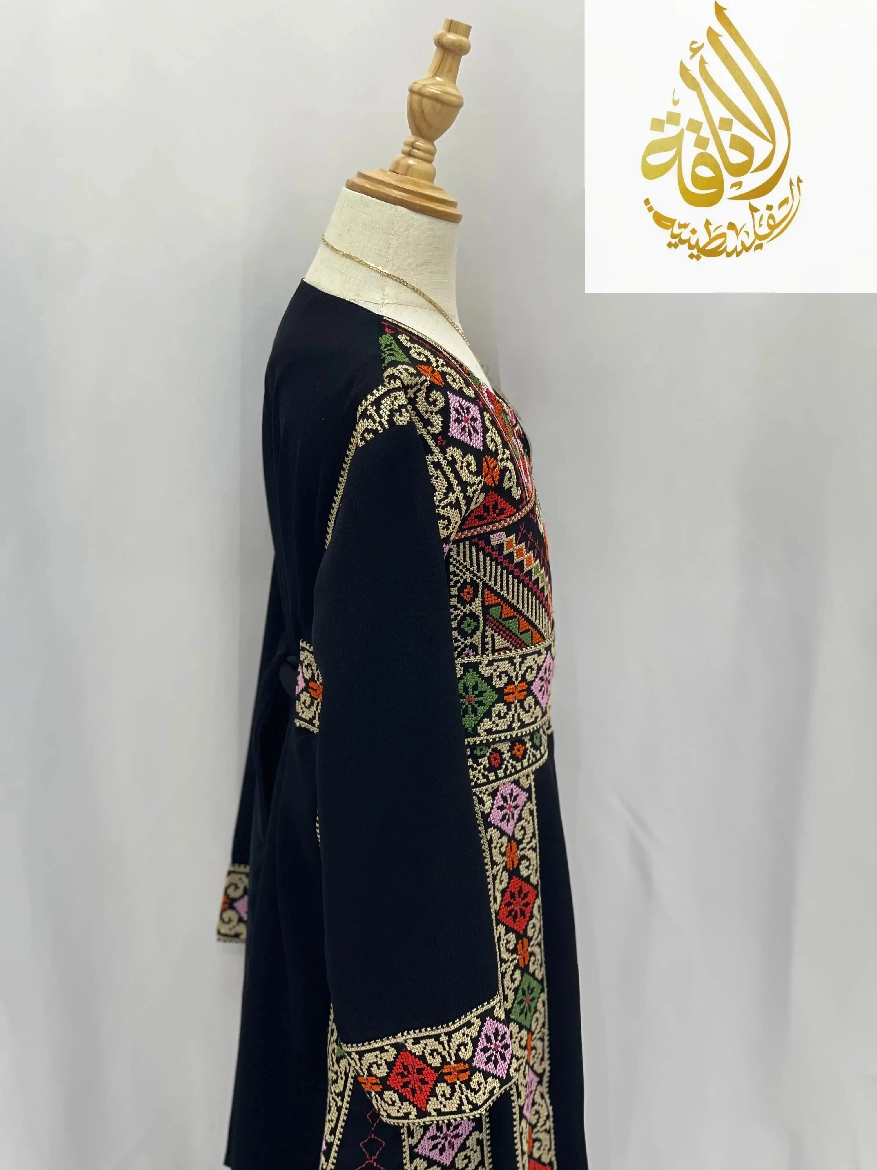 Palestinian Elegance embroidered thoub for girls with colorful traditional embroidery on black fabric