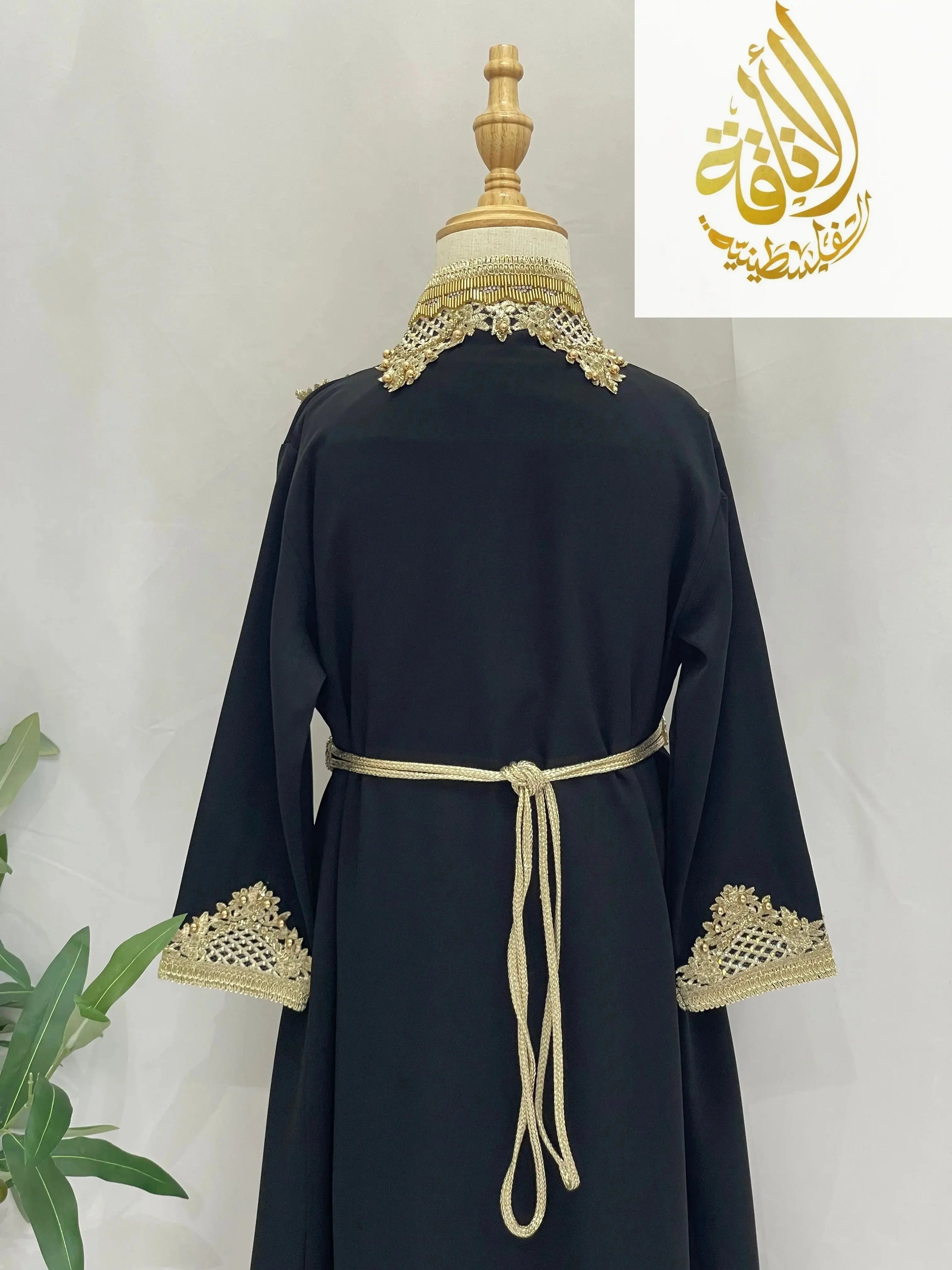 Black Princess Sema Girls Luxury Kaftan with gold lace detailing on collar and cuffs by Palestinian Elegance