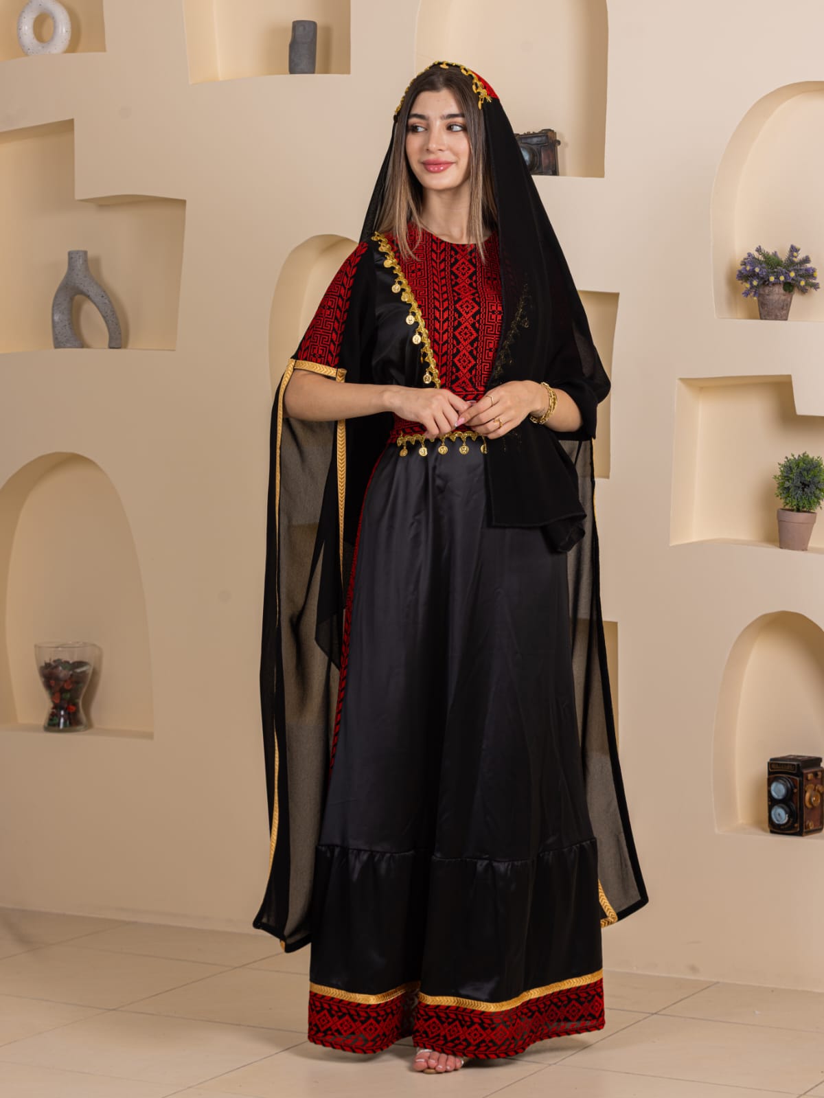 Qamar Embroidered Dress by Palestinian Elegance red embroidered bodice black flowing skirt sheer shawl with gold trim