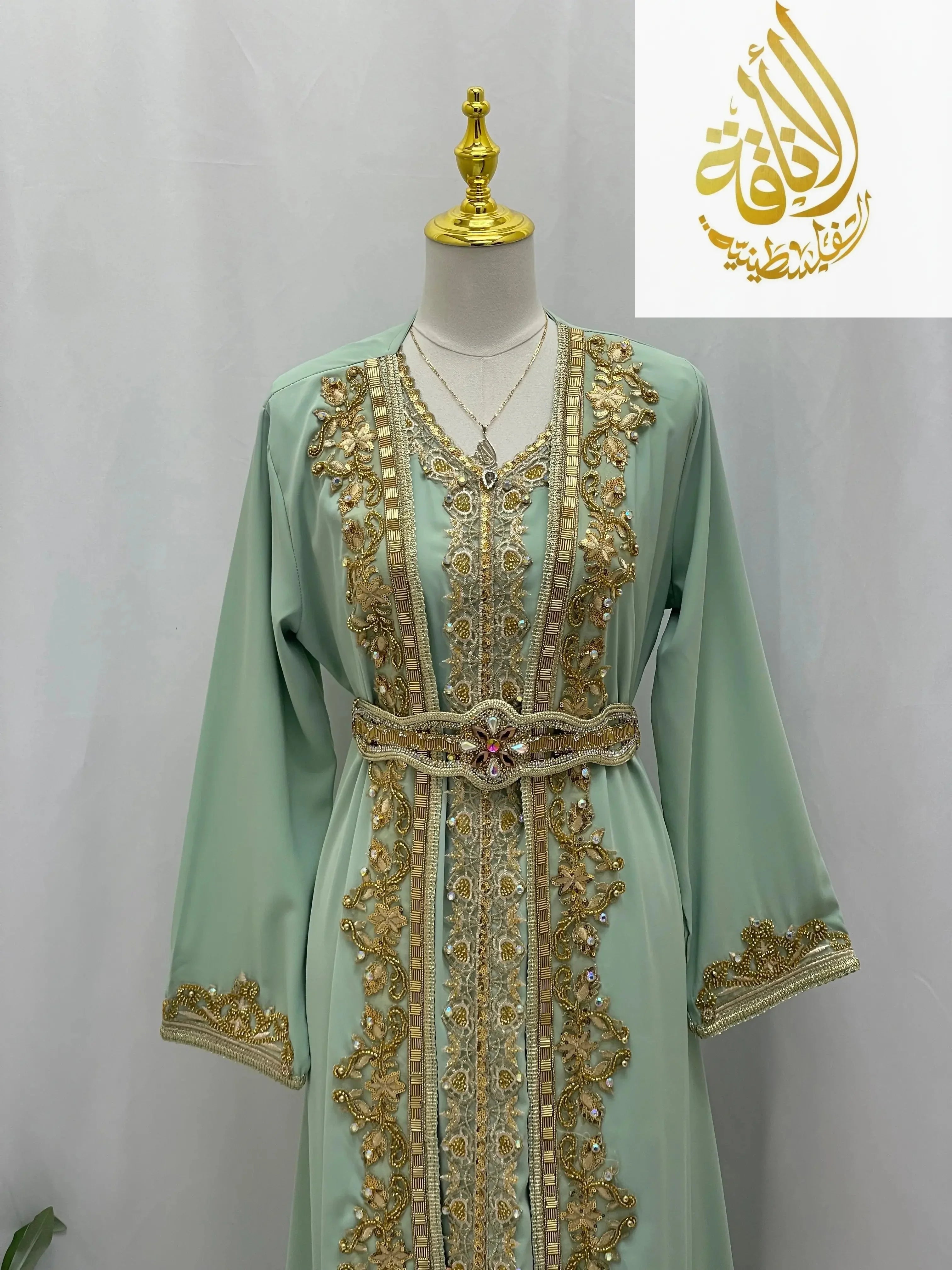 Palestinian Elegance Rahaf Moroccan Style Kaftan in mint green with gold embroidery and embellished belt