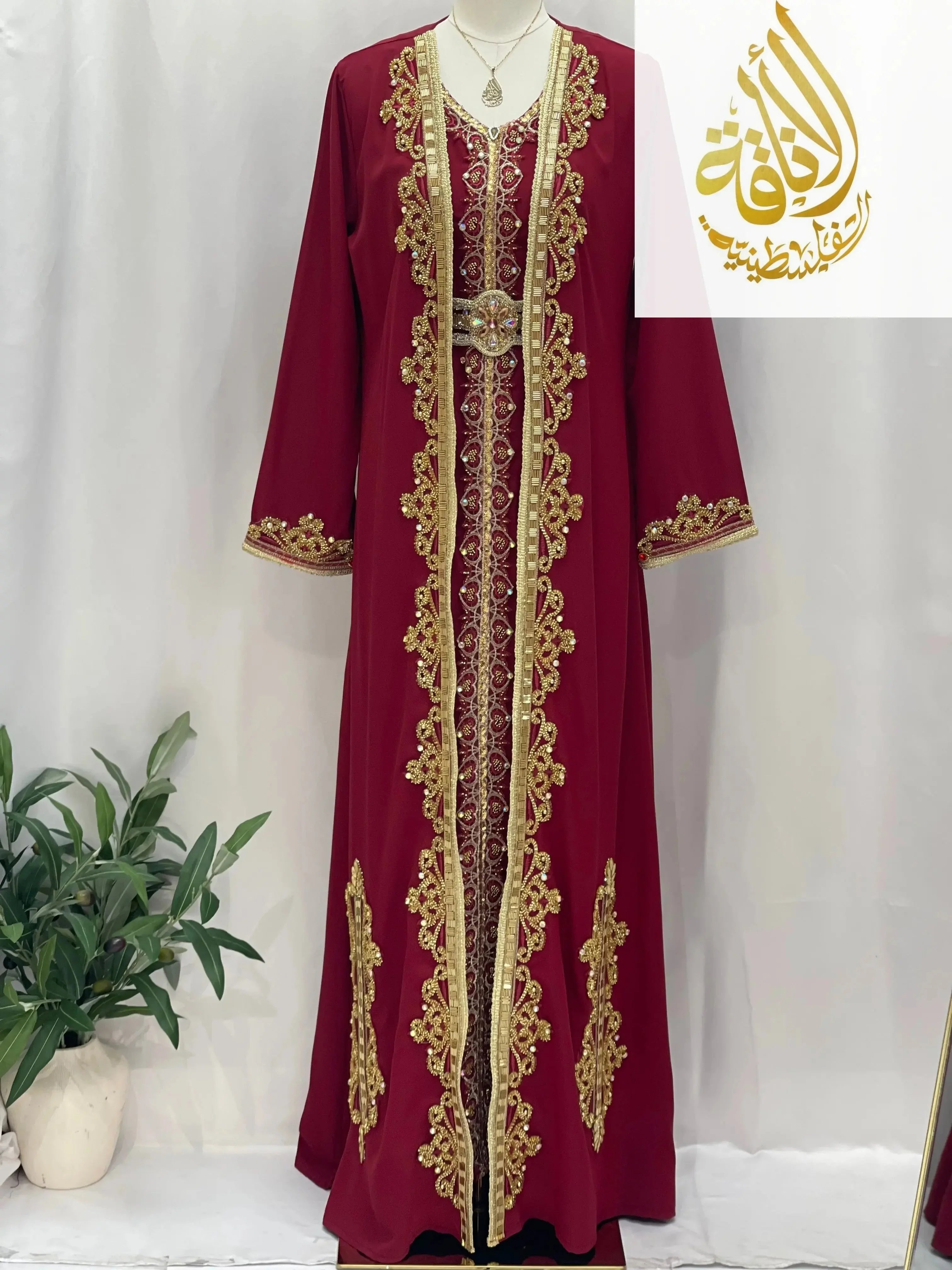 Palestinian Elegance Rahaf Moroccan Style Kaftan in burgundy with gold embroidery and intricate detailing