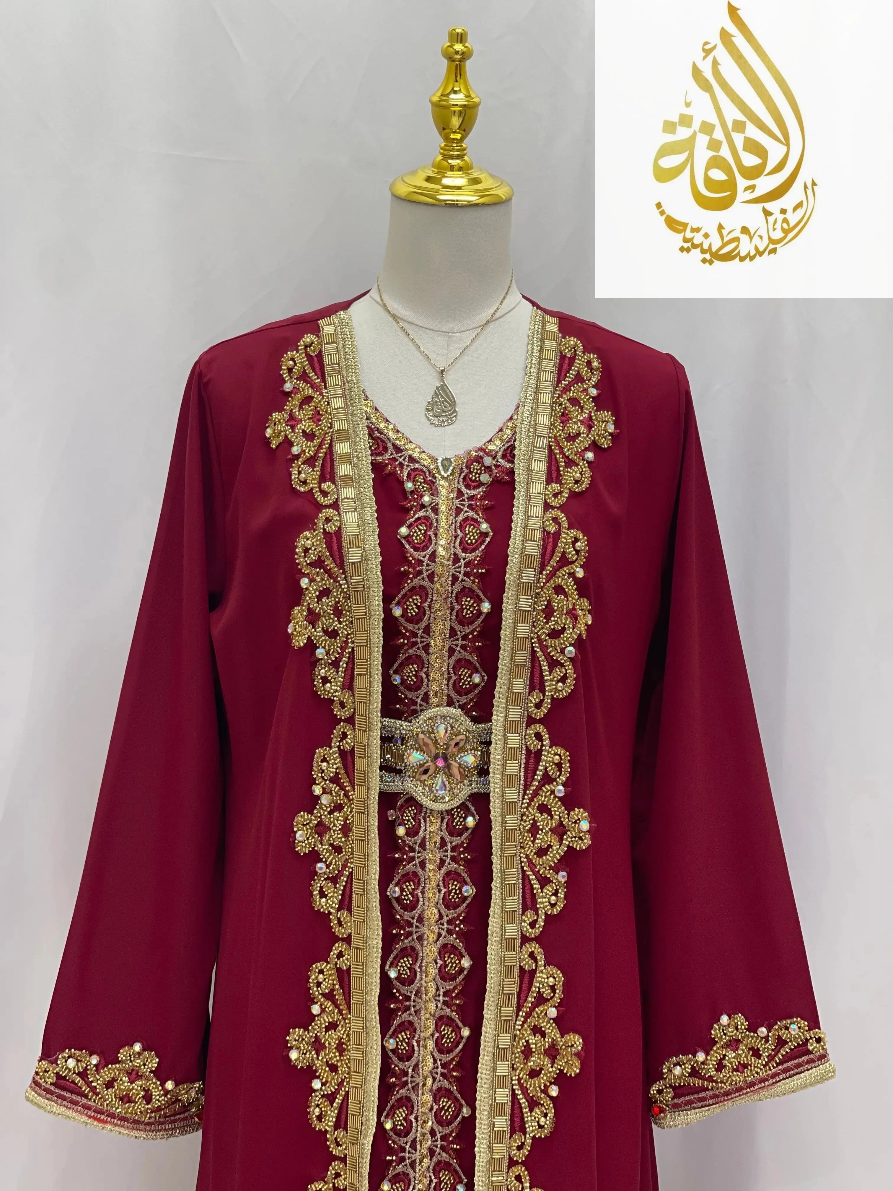 Rahaf Moroccan Style Kaftan in deep red with gold embroidery and decorative belt by Palestinian Elegance