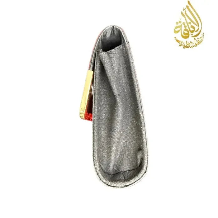 Side view of Palestinian Elegance red kuffiyeh handbag showing fabric and structure