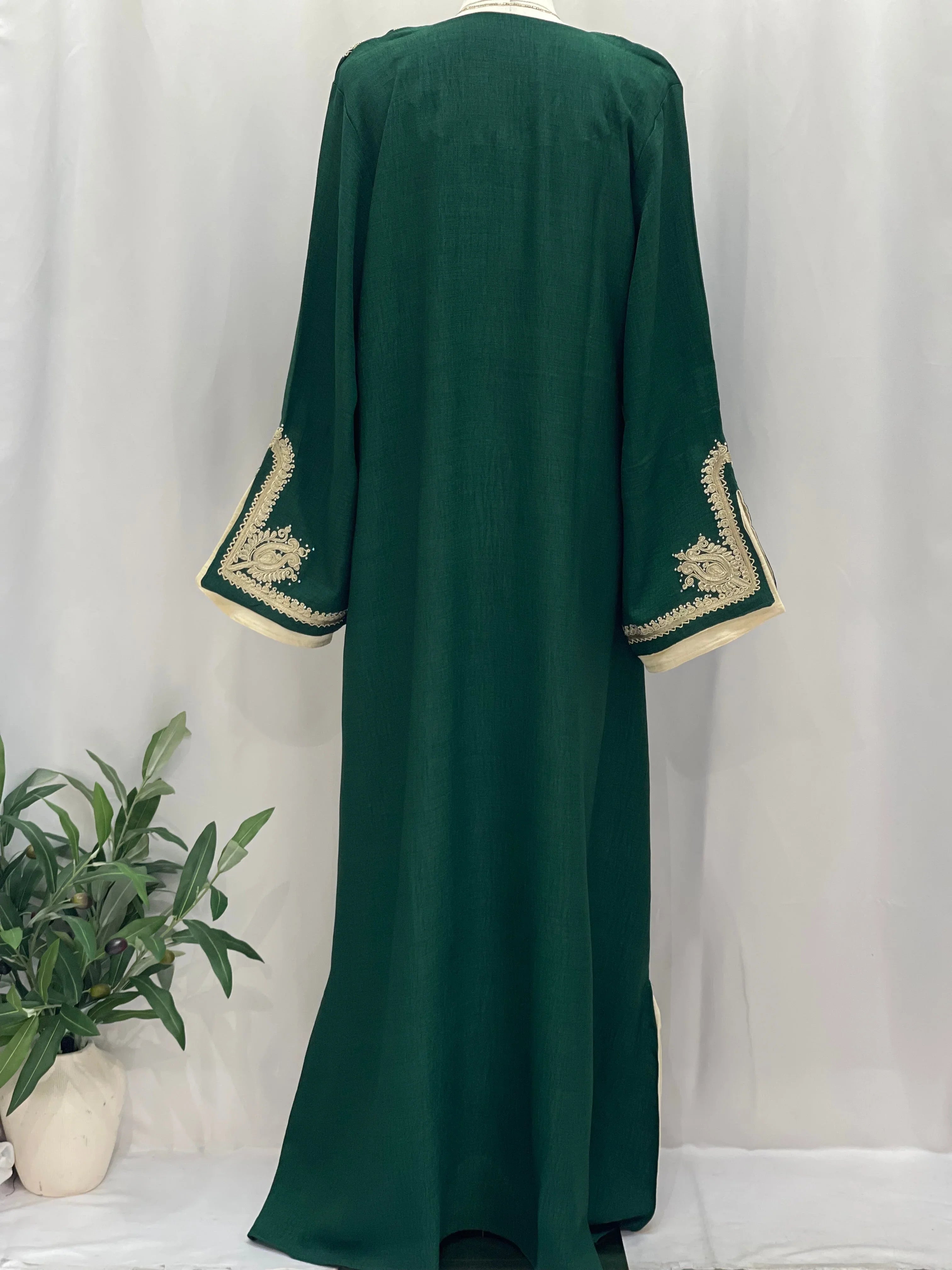 Regal Moroccan Jalabiya by Palestinian Elegance long green gold embroidered sleeve back view modest flowing gown