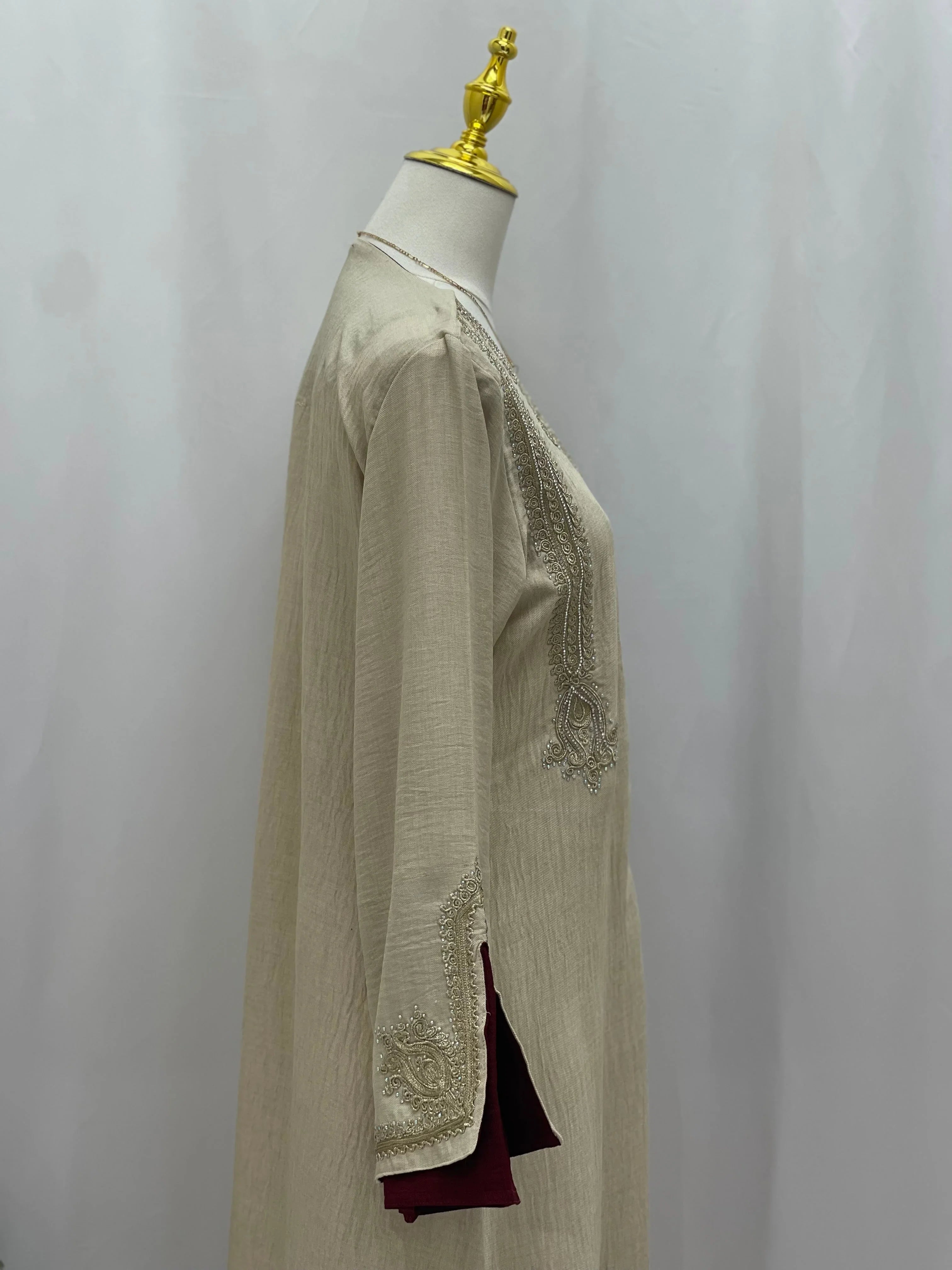Regal Moroccan Jalabiya beige embroidered long kaftan with side slit and burgundy inner layer by Palestinian Elegance