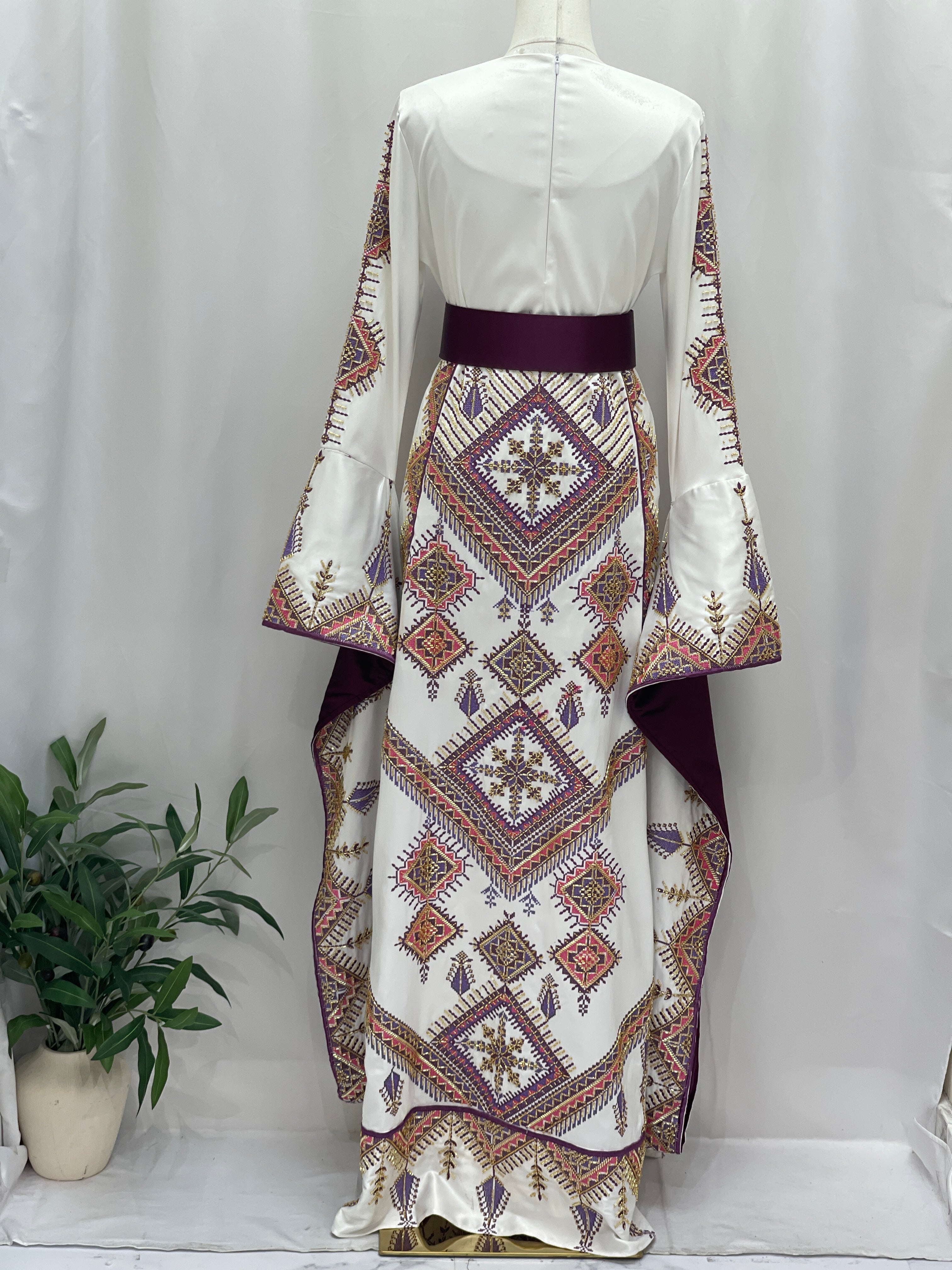 Back view Bridal Embroidered Thoub Gown by Palestinian Elegance white dress with geometric embroidery and wide bell sleeves