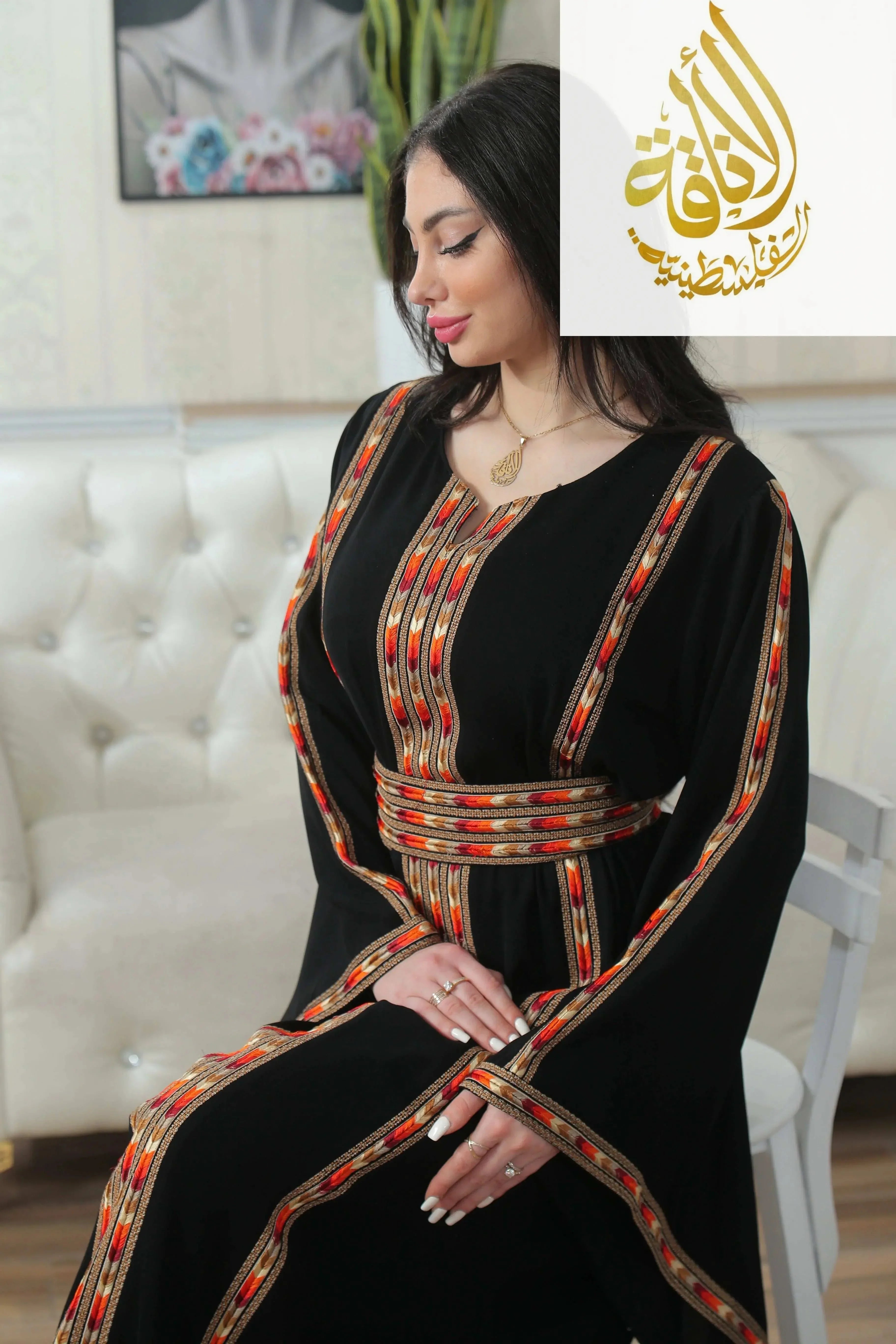 Palestinian Elegance Salam Manjal Embroidered Thoub black traditional dress with intricate colorful embroidery