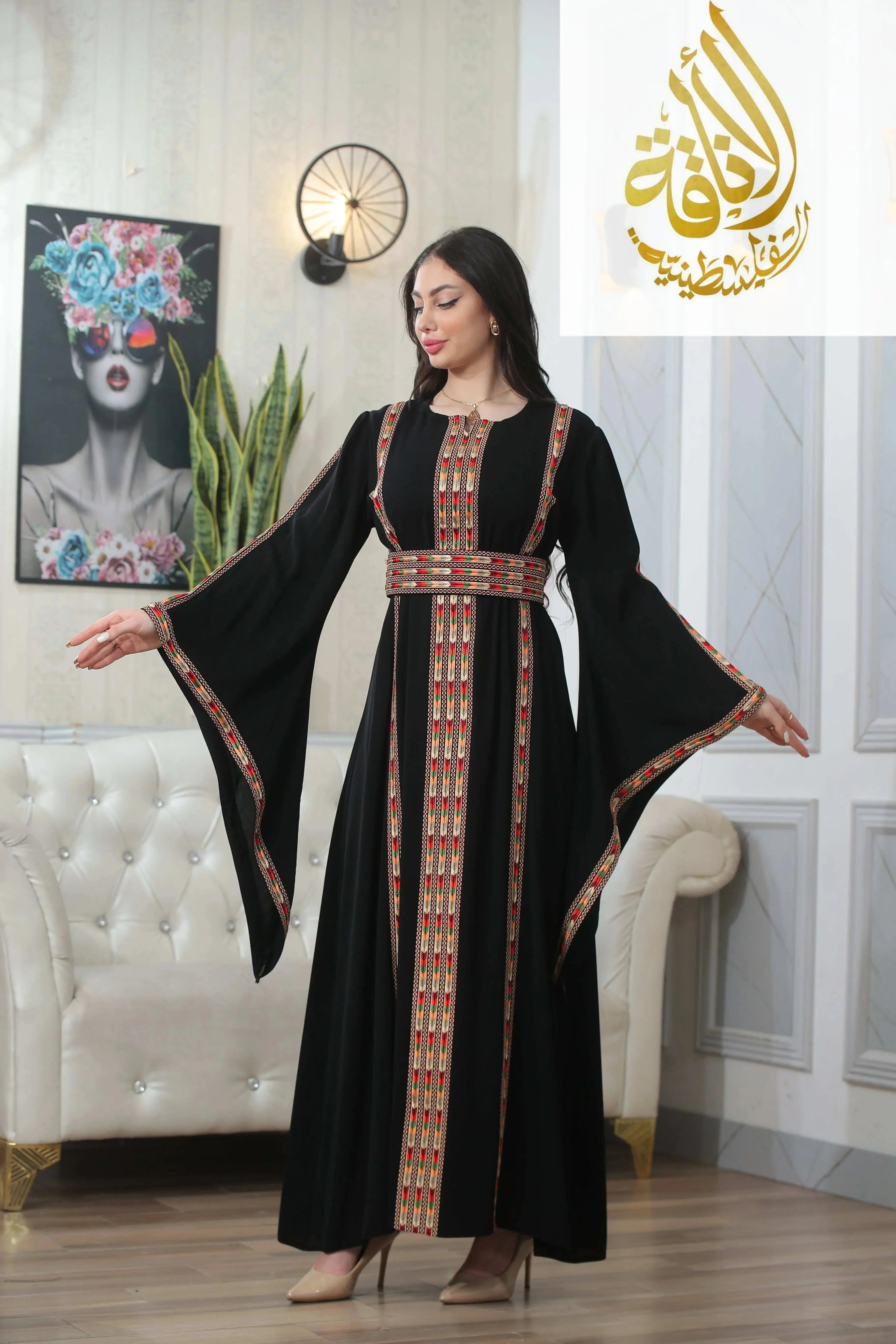 Palestinian Elegance Salam Manjal Embroidered Thoub in black with traditional colorful embroidery