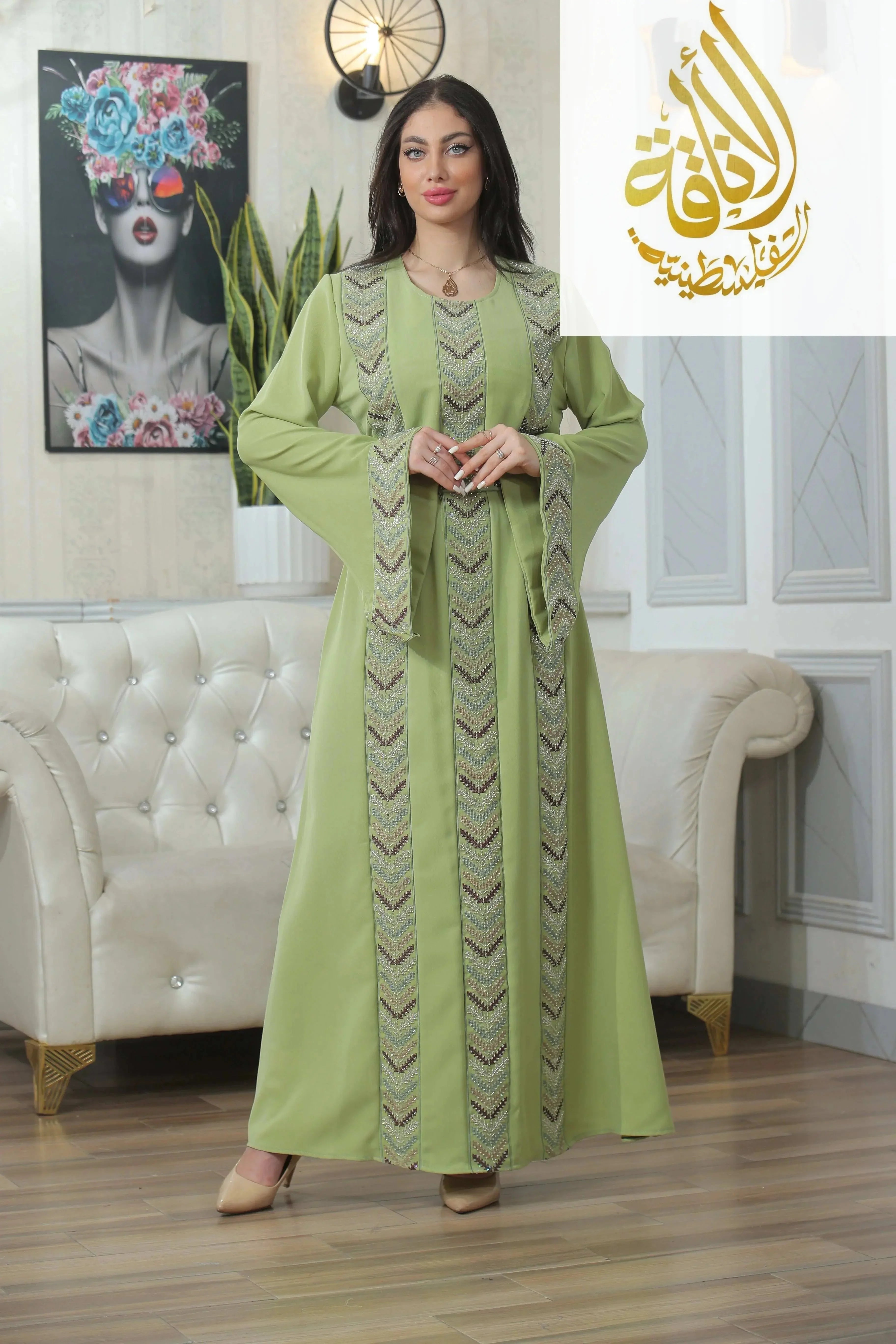 Palestinian Elegance Seham Embroidered Beads Thoub in light green with detailed bead embroidery