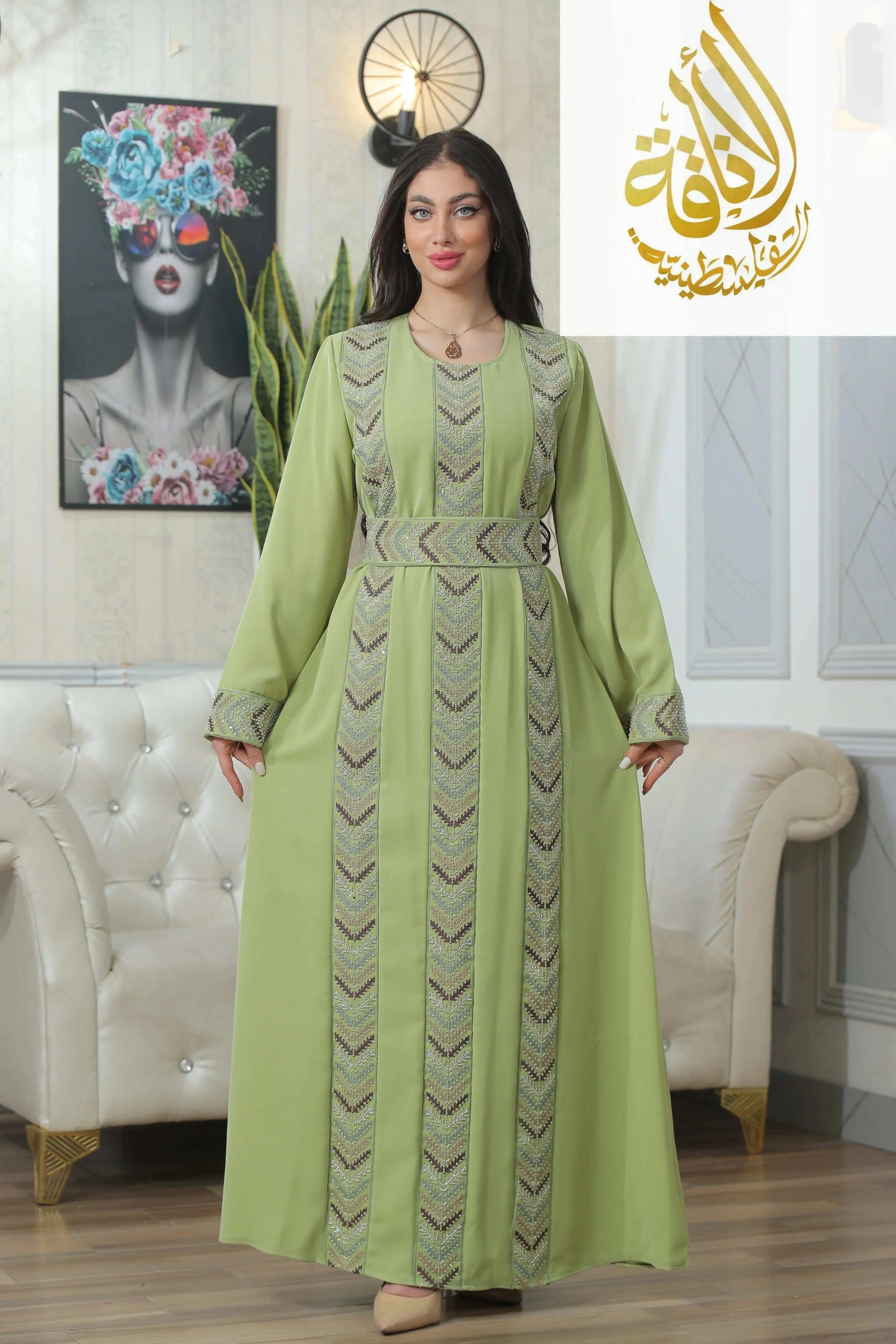 Seham Embroidered Beads Thoub by Palestinian Elegance in light green with detailed bead embroidery