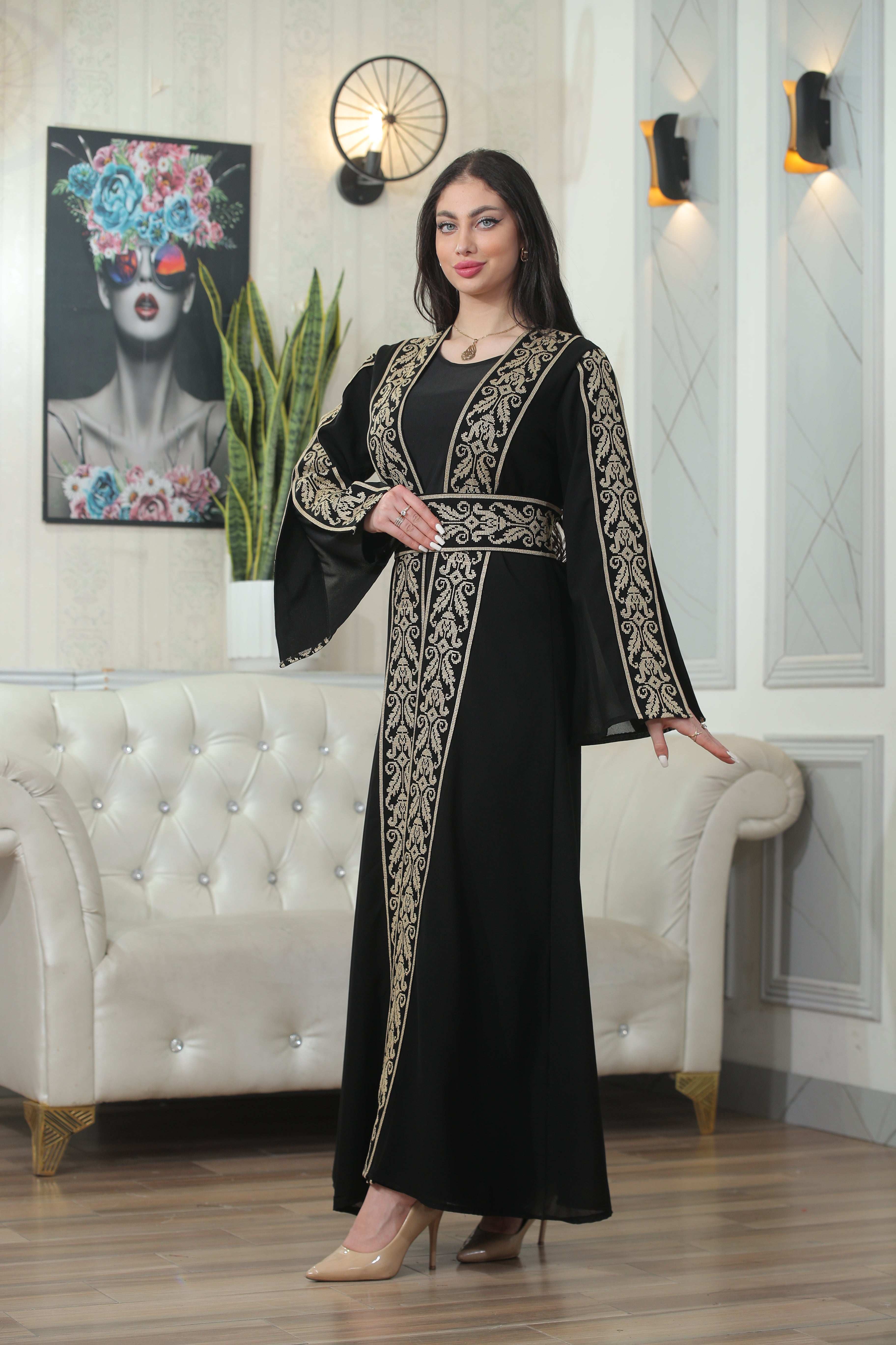 Palestinian Elegance Shereen Embroidered Bisht Abaya in black with intricate gold embroidery and wide sleeves
