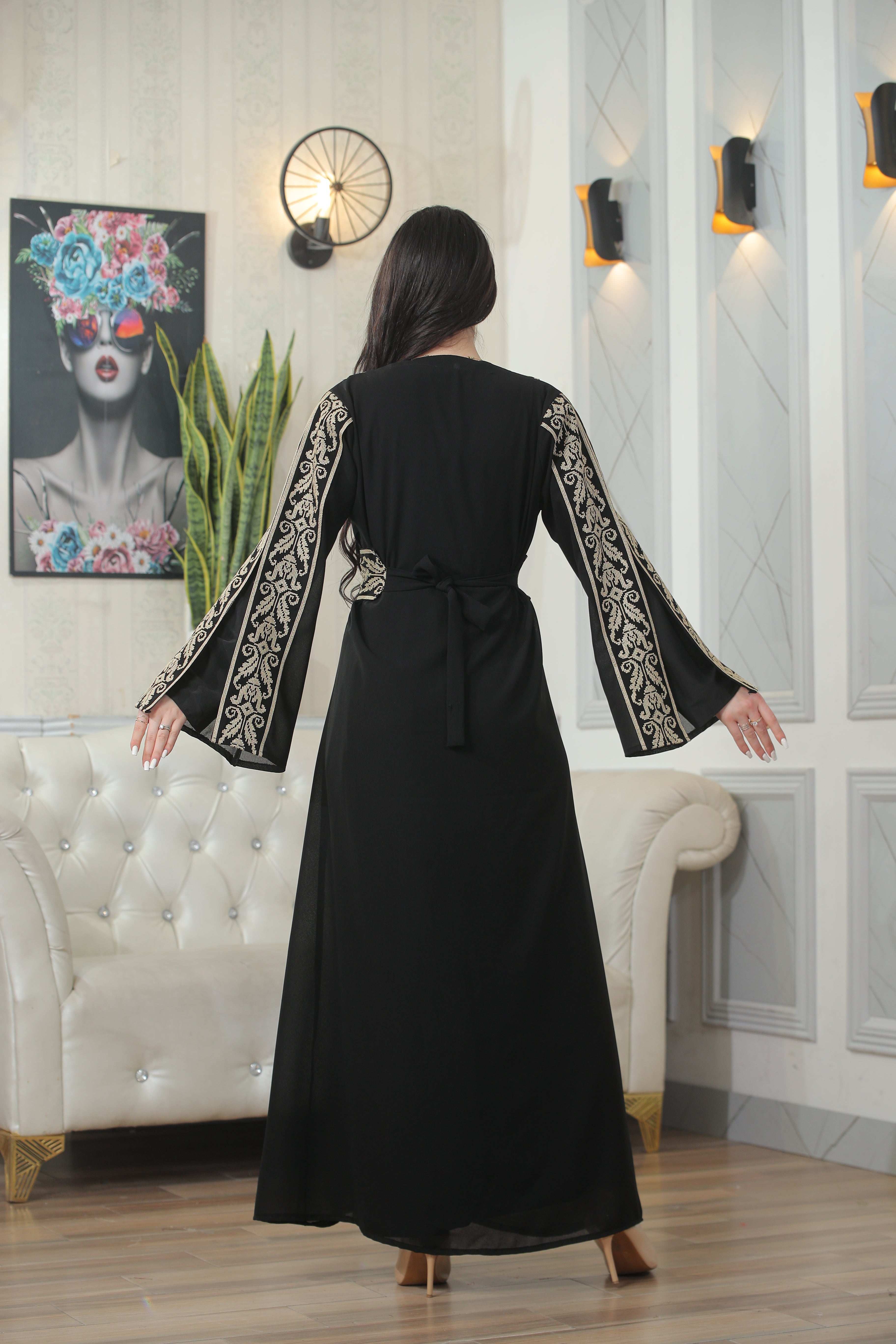 Back view of Shereen Embroidered Bisht Abaya by Palestinian Elegance with detailed sleeve embroidery