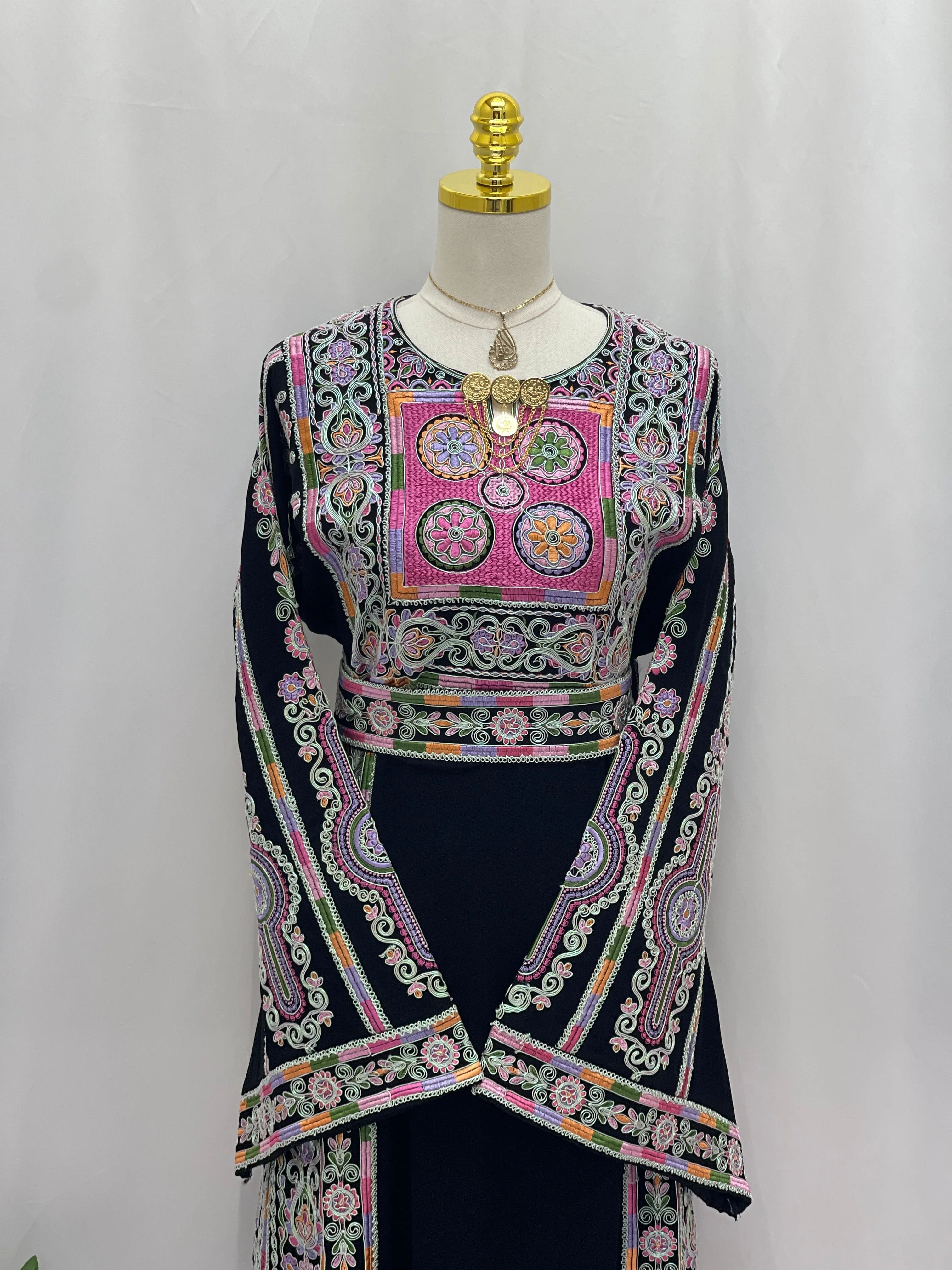 Palestinian Elegance Silver Piping Embroidered Thobe navy dress with pink floral chest panel and long embroidered sleeves