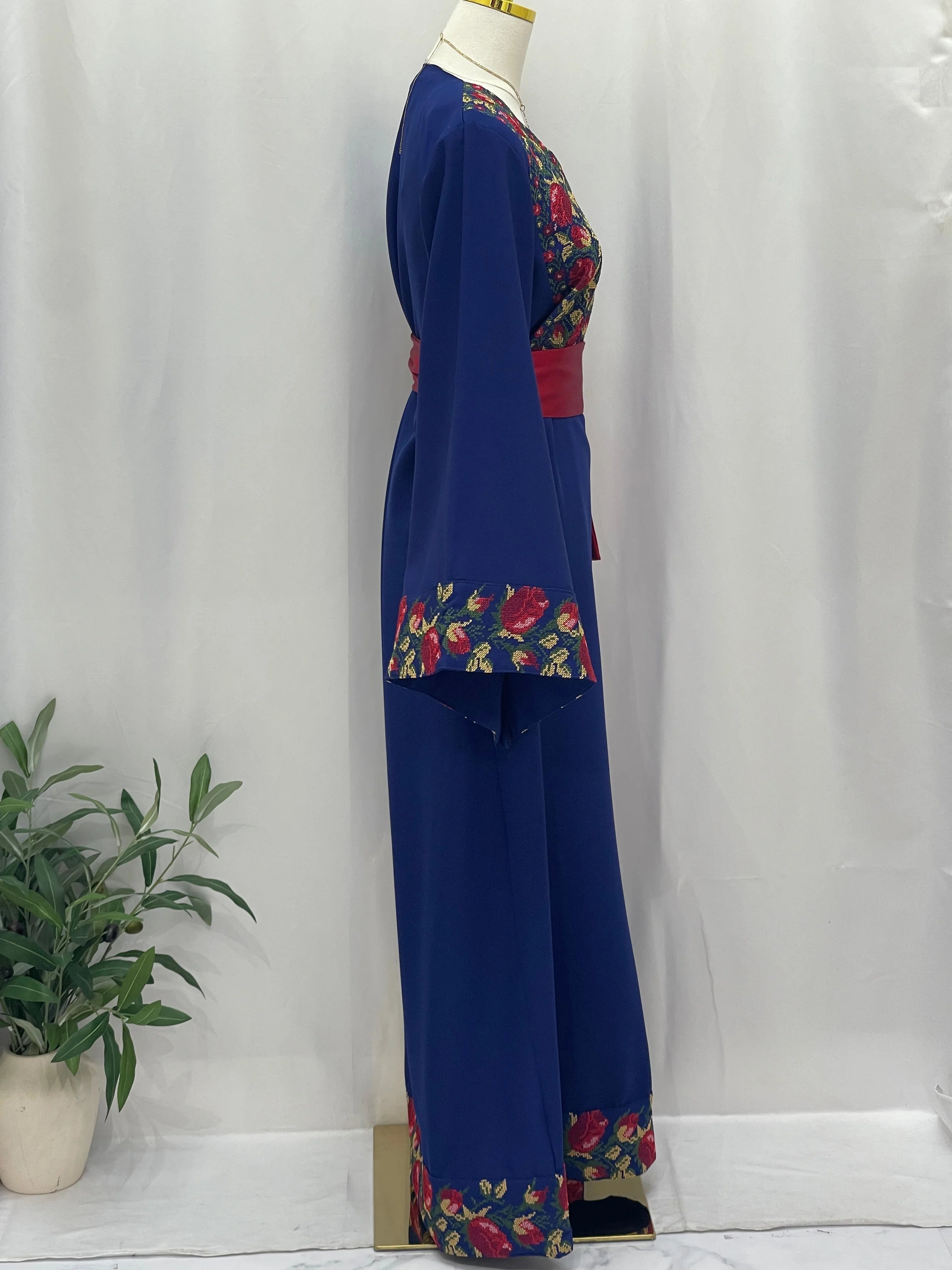 Embroidered long sleeve Palestinian Elegance Blossom Royal Blue Thobe with floral embroidery and sash