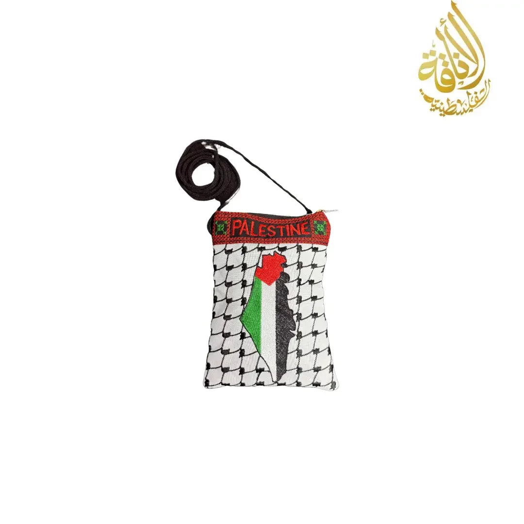 Embroidered Palestinian tote bag with traditional black and white pattern and Palestine text band