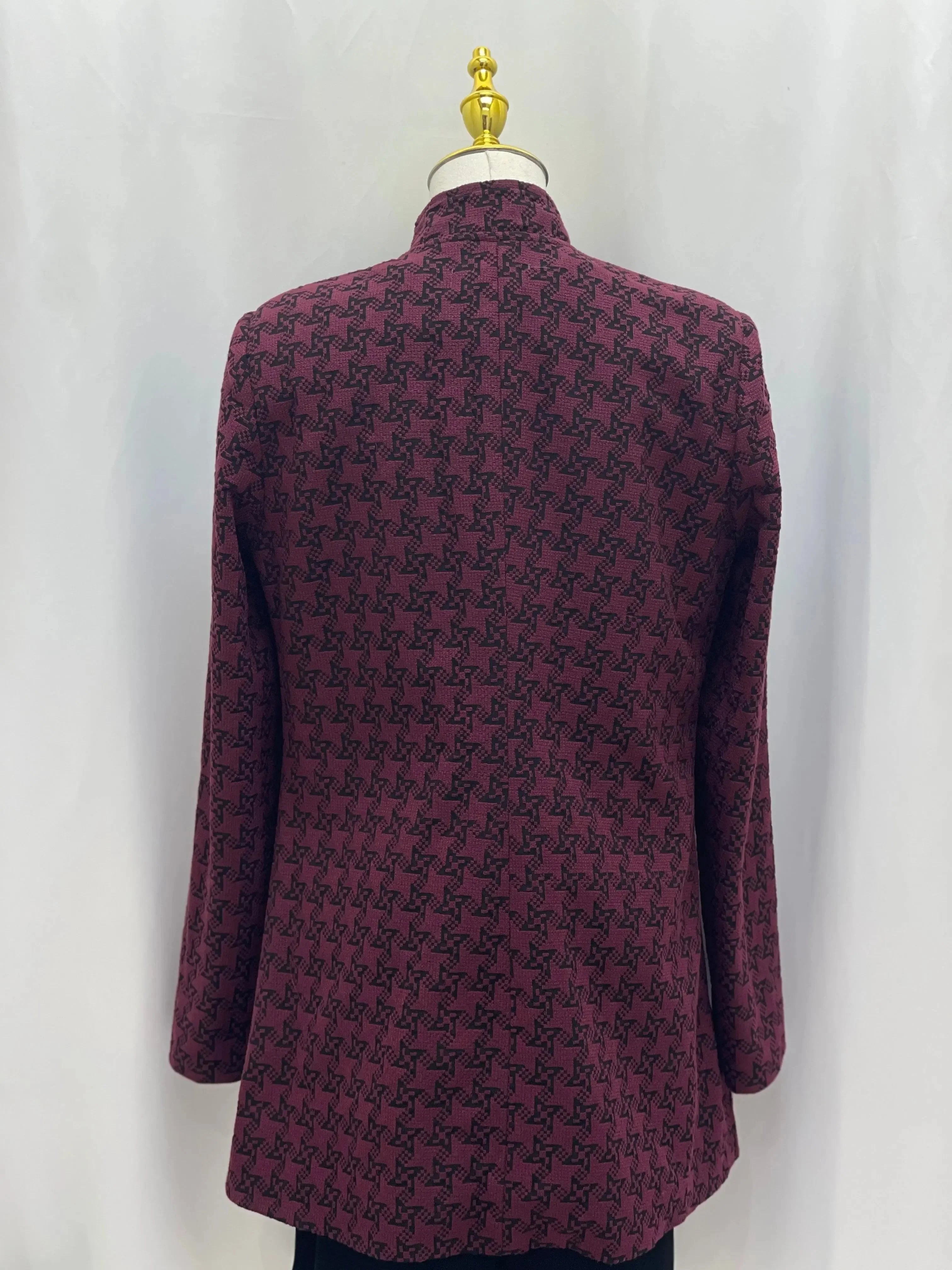 Back view of an embroidered Palestinian blazer in maroon with black intricate patterns by Palestinian Elegance