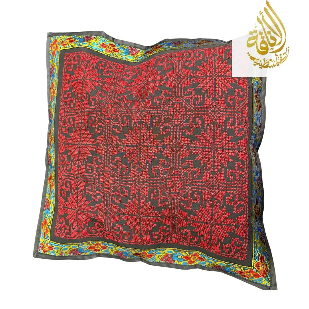 Palestinian Elegance tatreez pillow cover with red and black traditional embroidery and colorful floral border