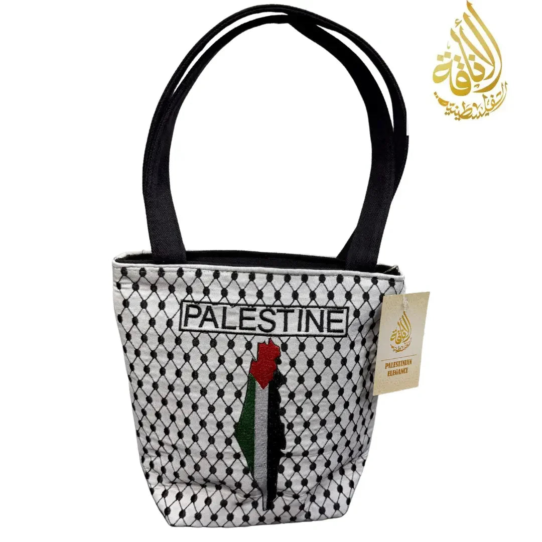 Palestinian embroidered tote bag with black and white patterned fabric and Palestine map design