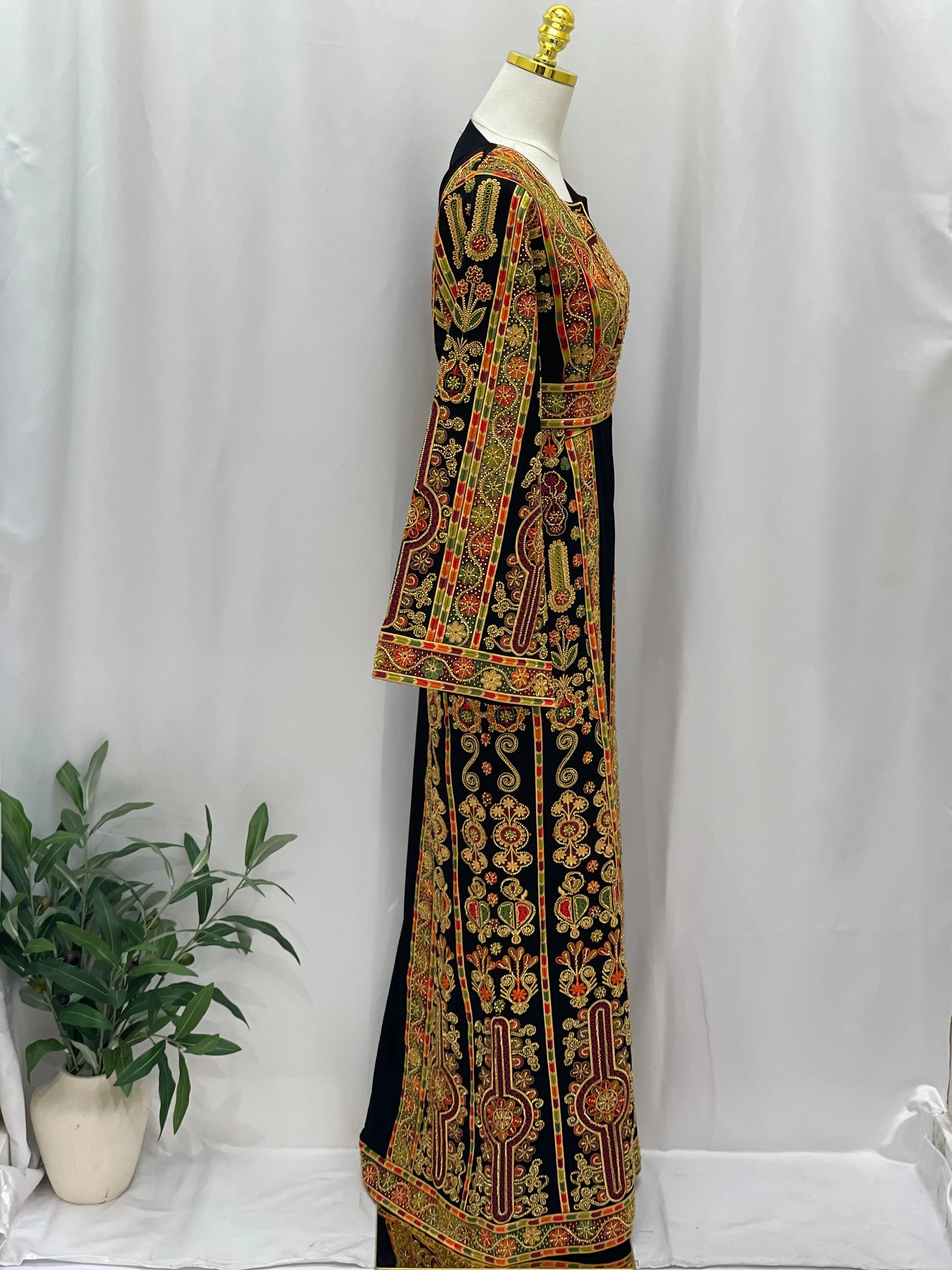 Palestinian Thoub with Beaded Embroidery black floor length dress side view on mannequin by Palestinian Elegance