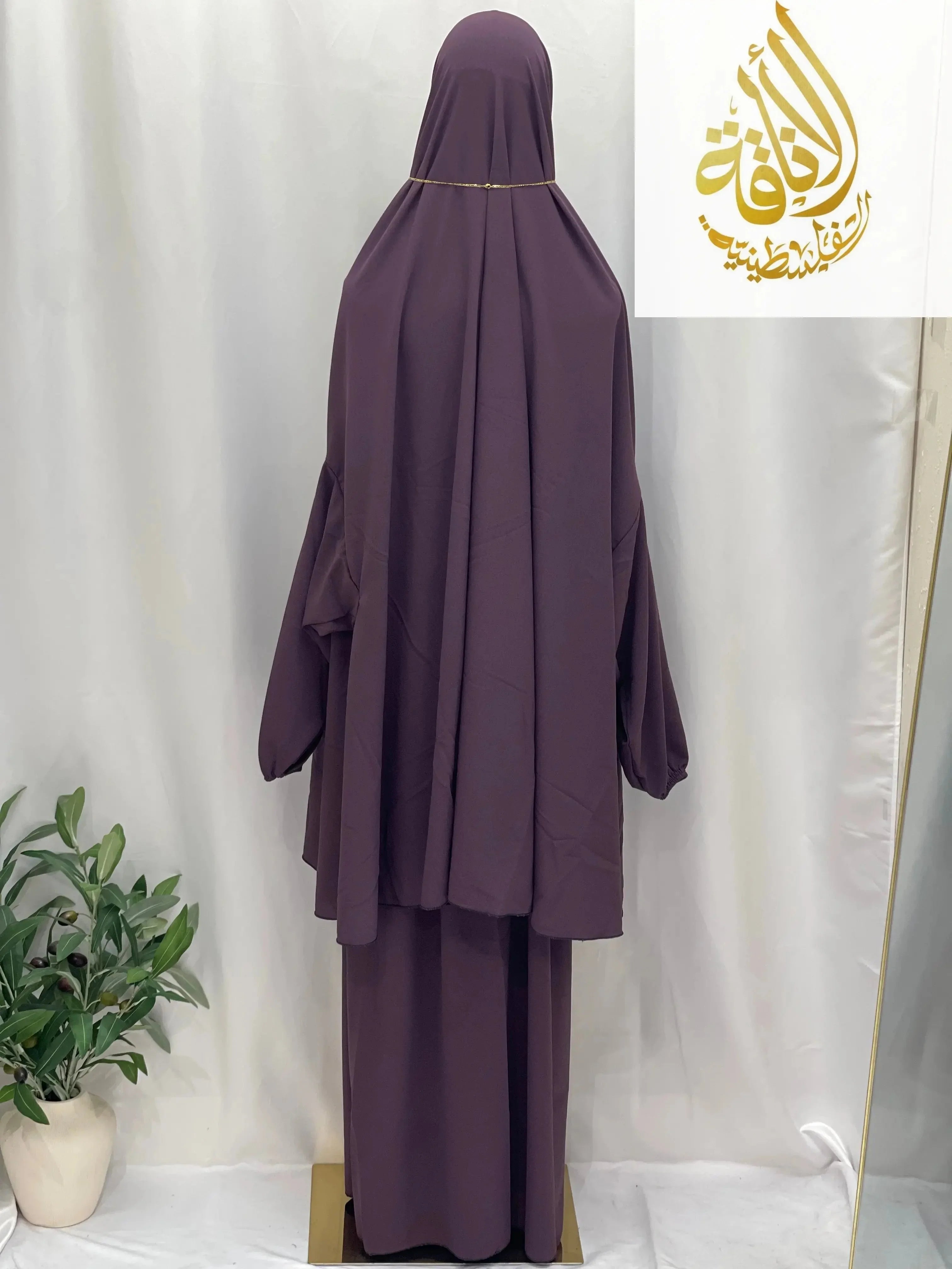 Palestinian Elegance two piece prayer outfit in deep purple with full coverage and loose fit for special occasions