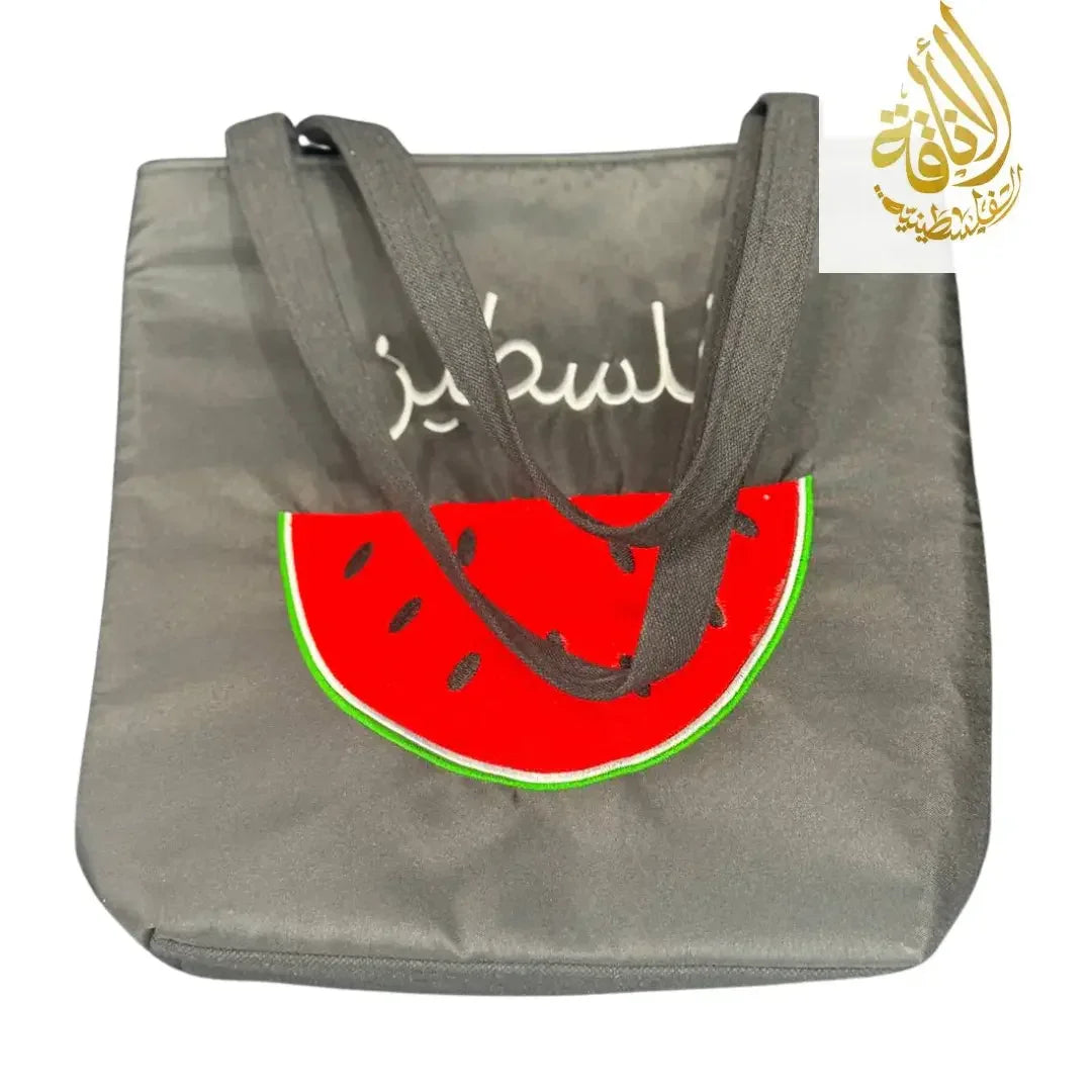 Palestinian watermelon tote bag in gray with red watermelon slice and Arabic script embroidery