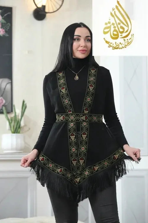  Soft and flowing chiffon vest with detailed floral embroidery.