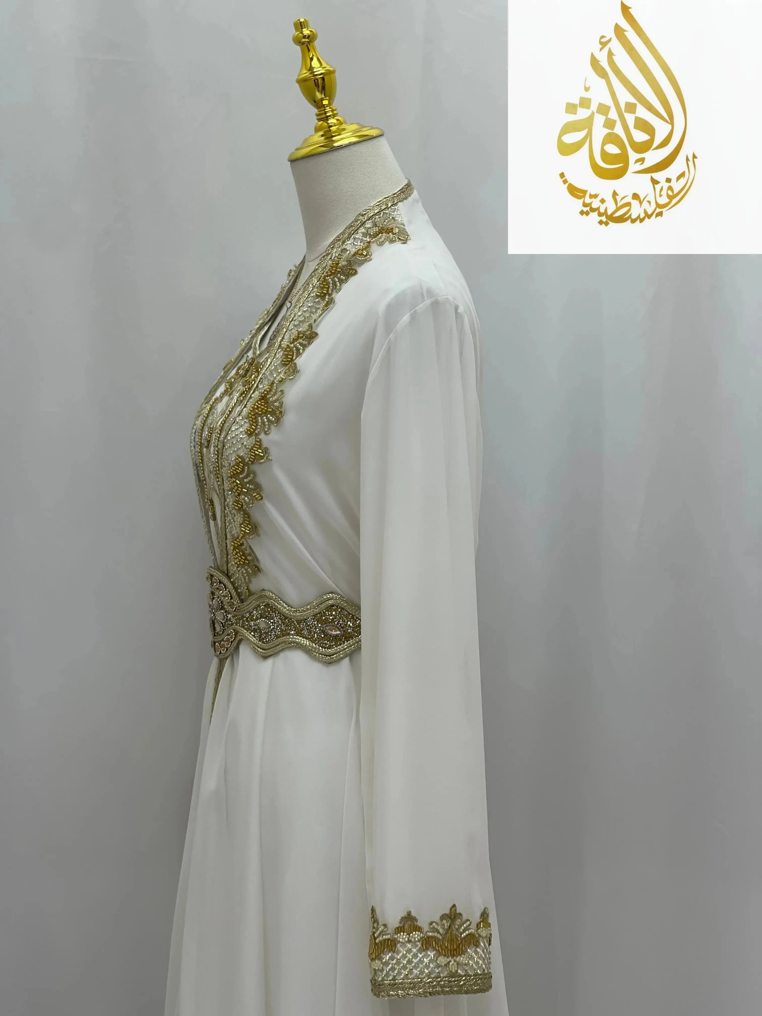 White Moroccan Style Kaftan with gold embroidery on sleeves and waist by Palestinian Elegance