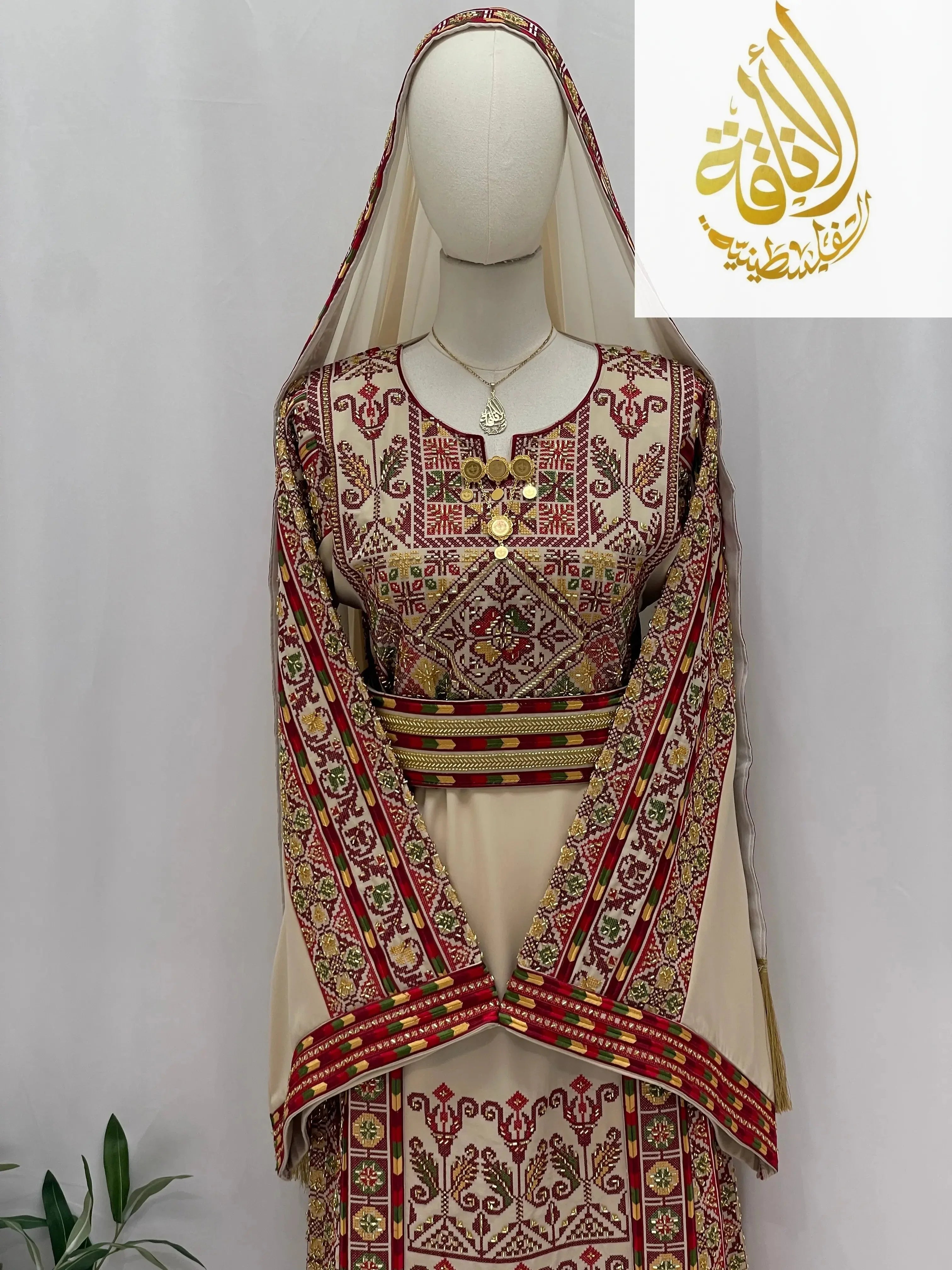 Palestinian Elegance Gold Beads Thoub with intricate red and gold embroidery on cream fabric