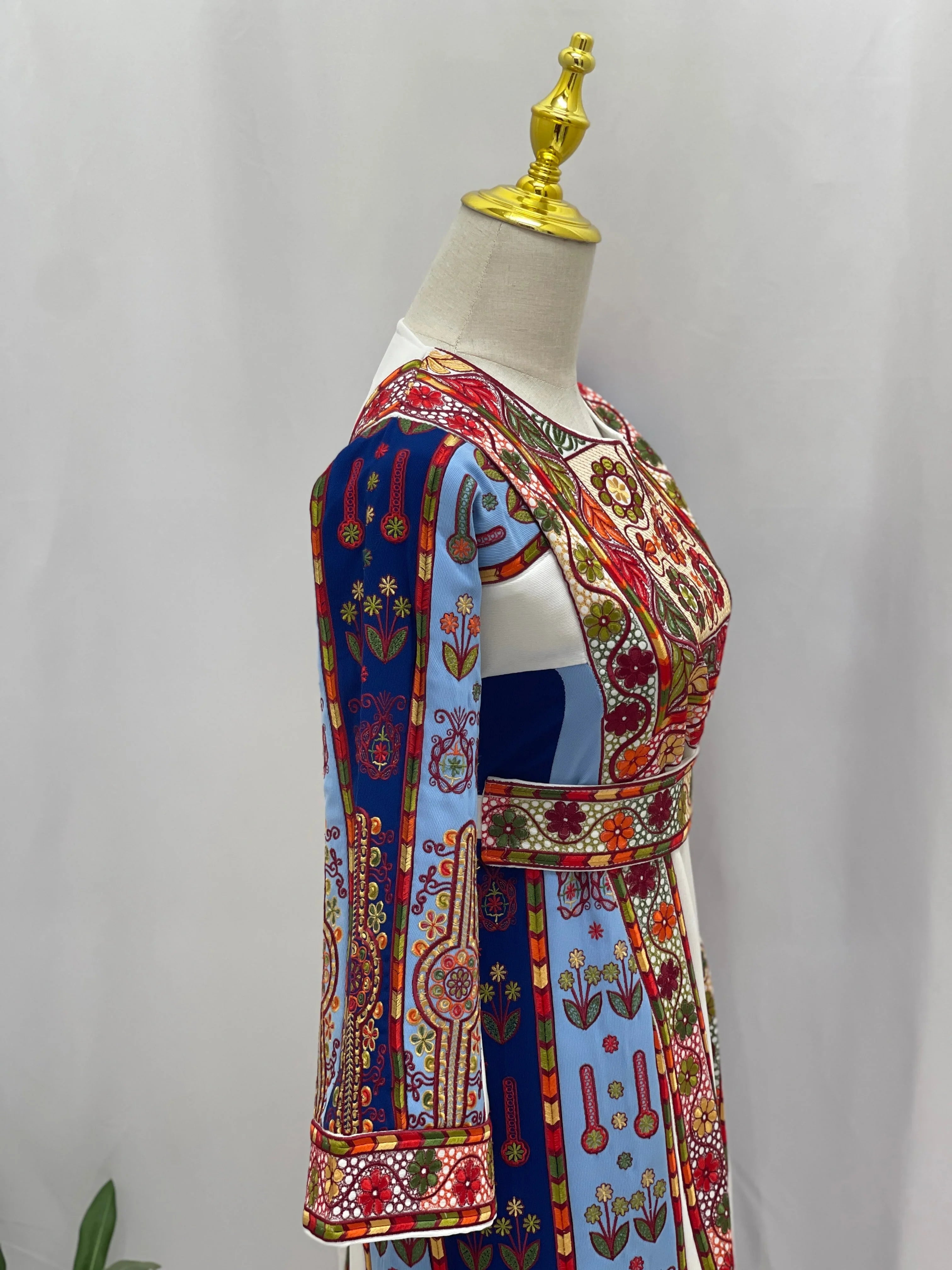 Colorful Embroidered Girls Thoub with intricate patterns and vibrant sleeves for tradition and style