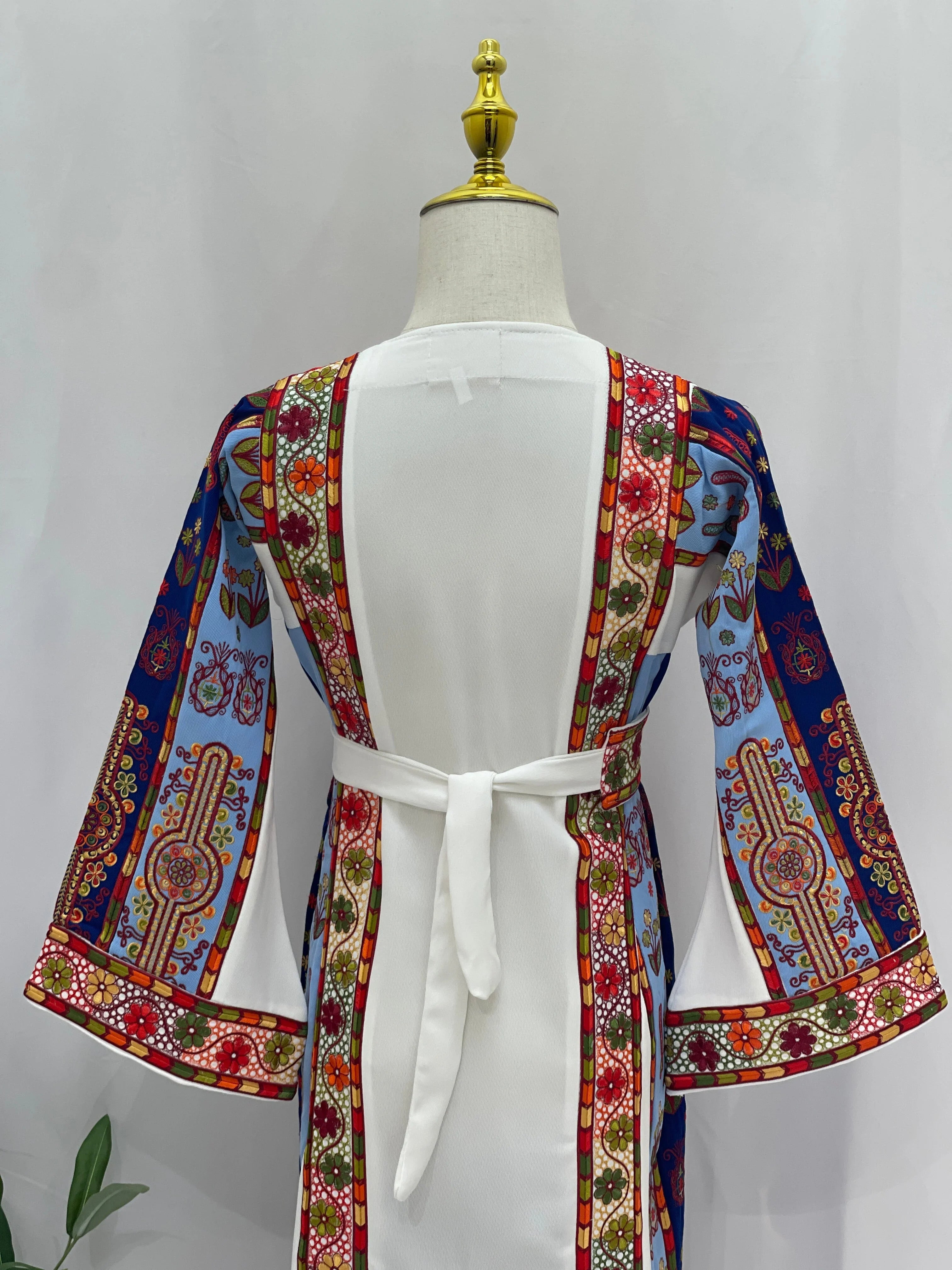Back view of Embroidered Girls Thoub with colorful patterns and elegant design for fashionable kids