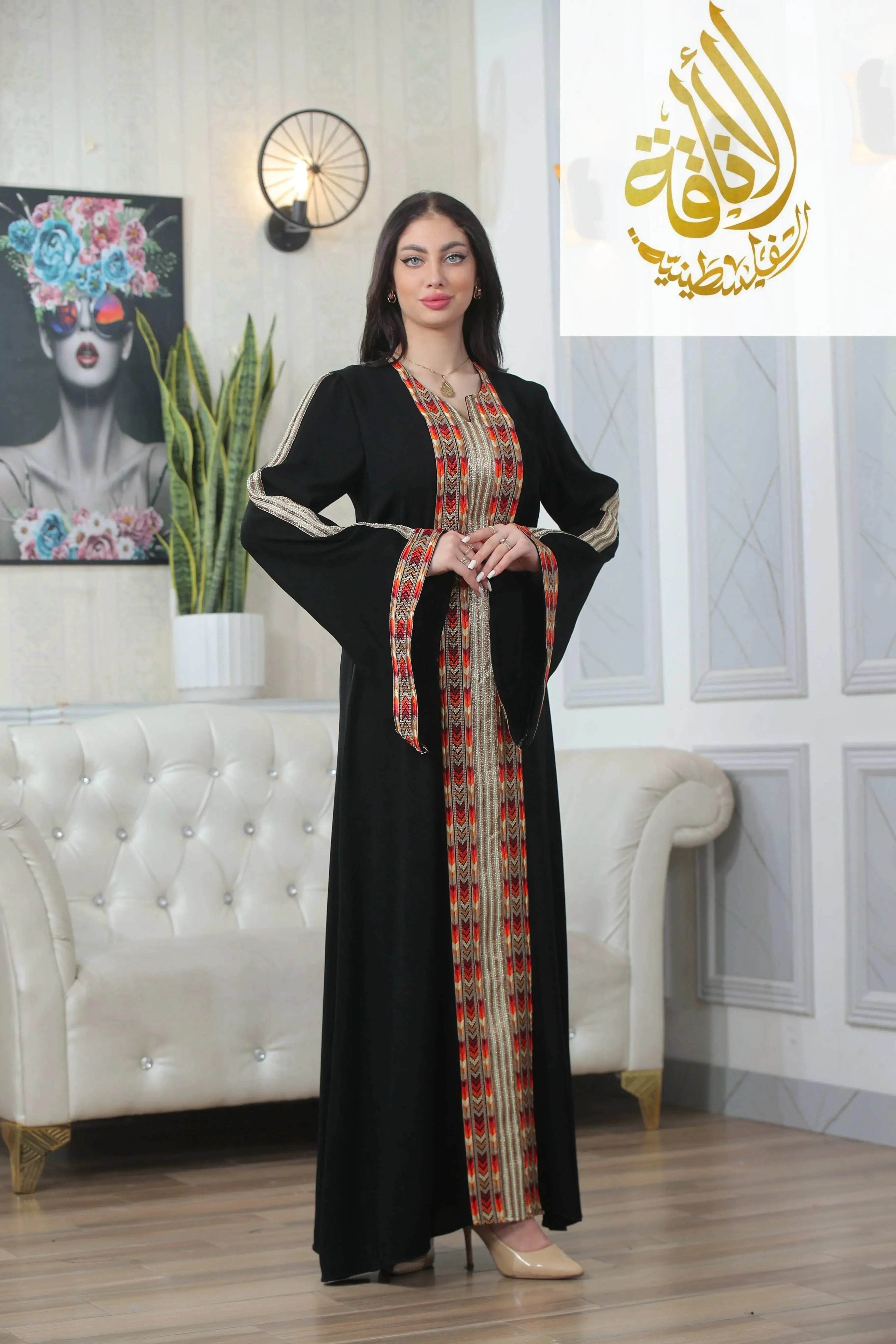 Palestinian Elegance Zena Embroidered Thoub in black with colorful traditional embroidery on front and sleeves