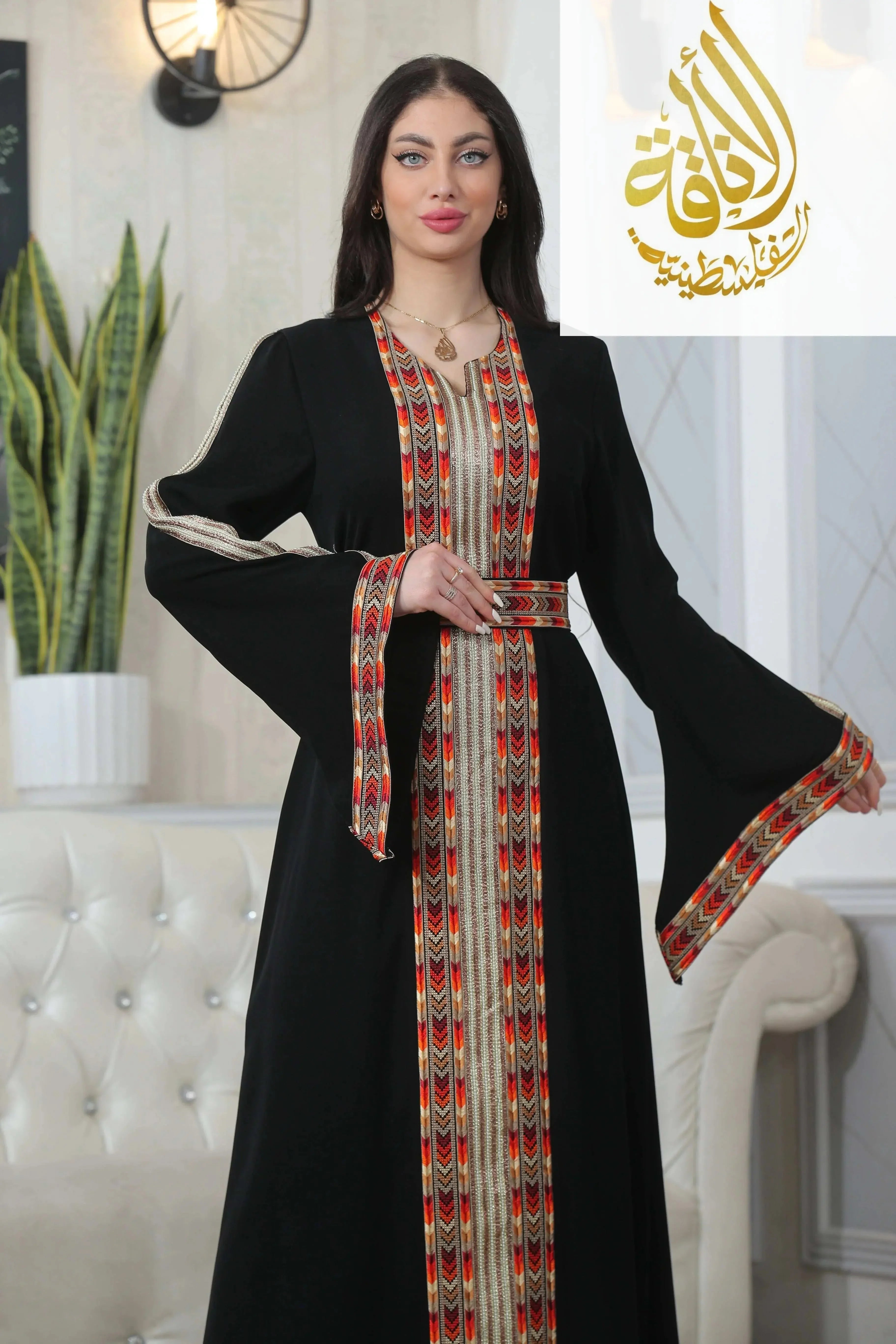 Palestinian Elegance Zena Embroidered Thoub in black with red and gold traditional embroidery details
