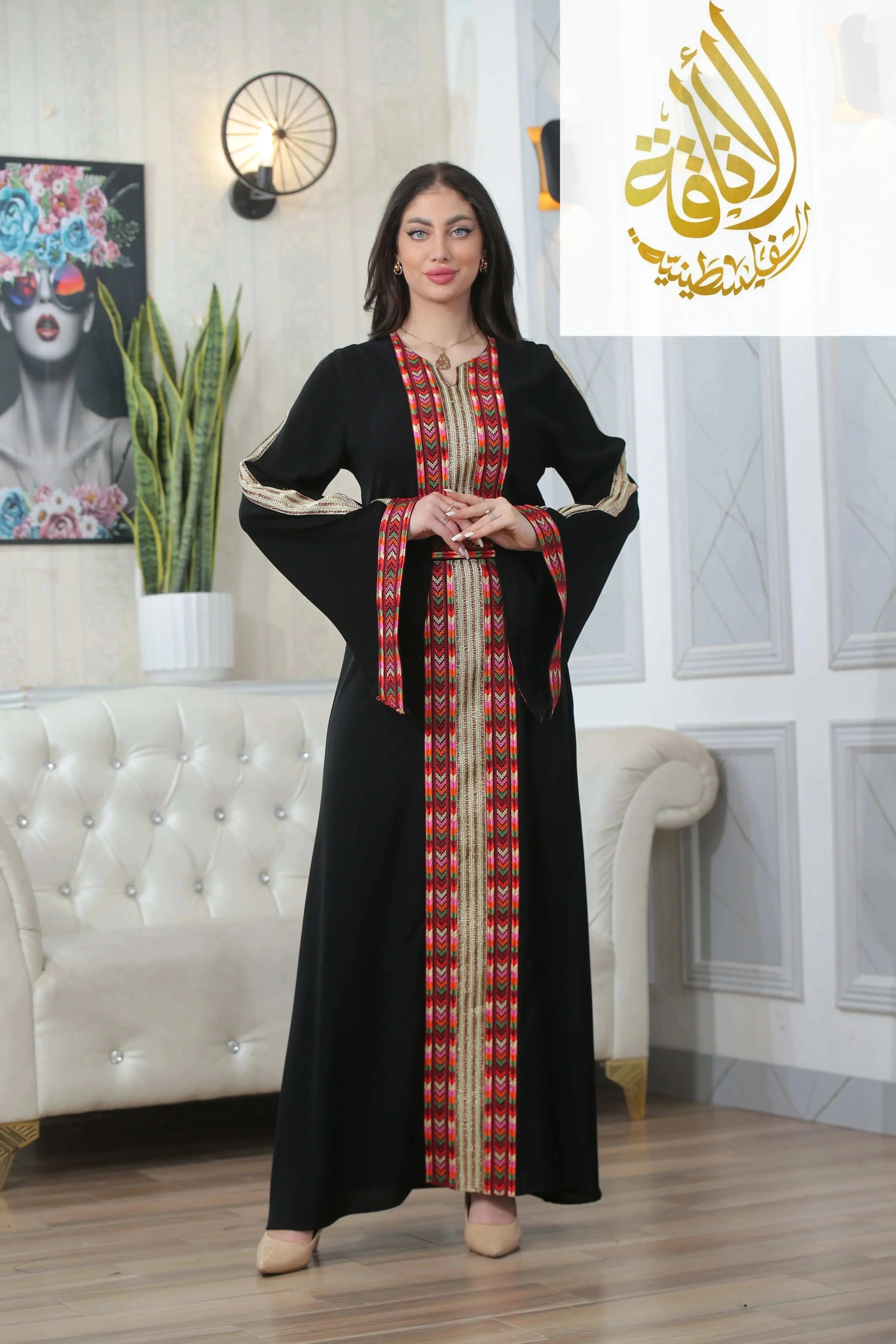 Palestinian Elegance Zena Embroidered Thoub black with red and gold embroidery and wide sleeves