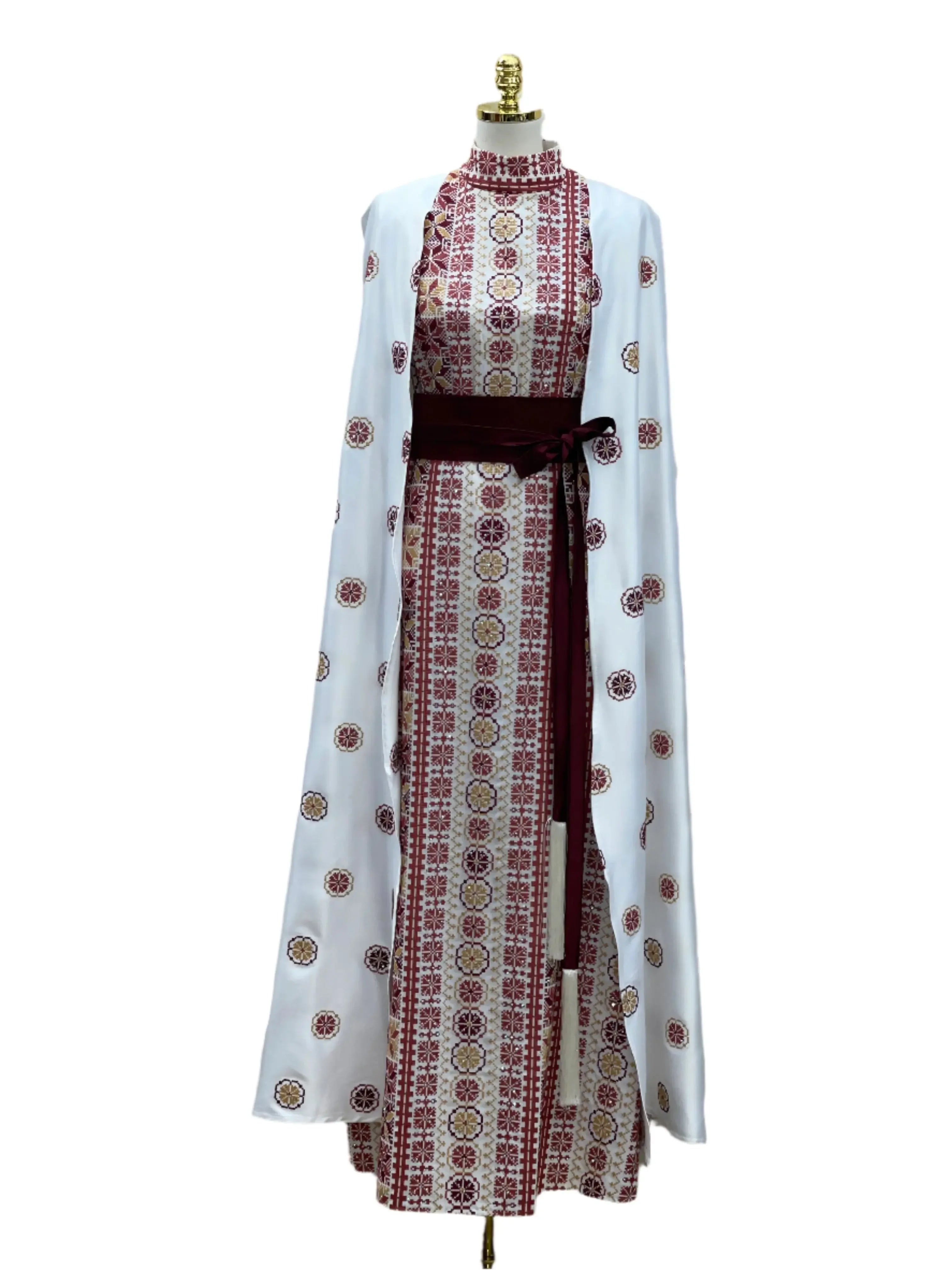 Palestinian Elegance modern embroidered thoub with intricate red and gold embroidery on white fabric