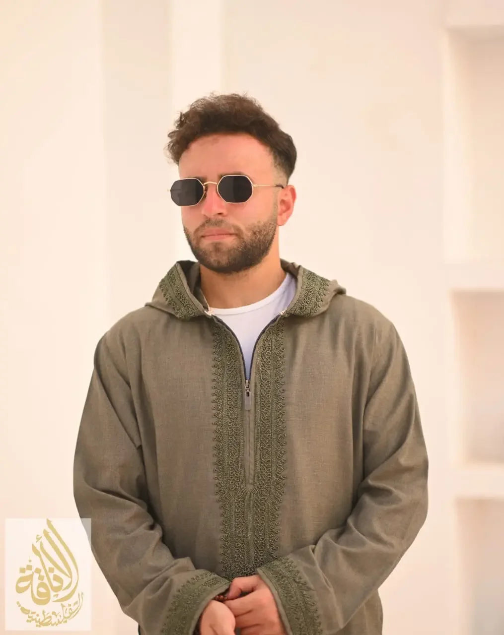 Moroccan jalabiya for men in olive green with detailed embroidery and a hood by Palestinian Elegance