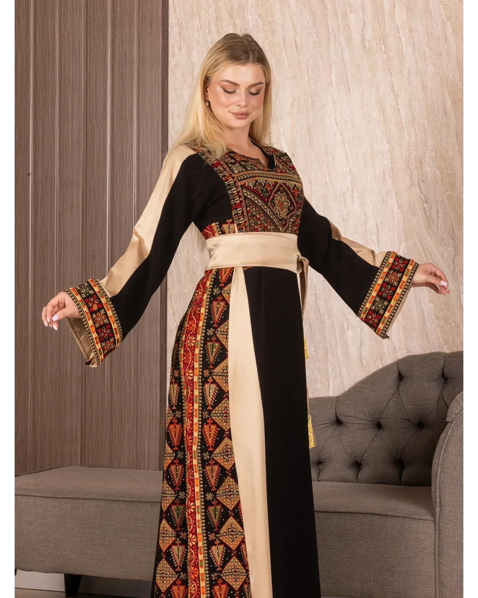 Palestinian embroidered thoub dress by Palestinian Elegance with intricate traditional embroidery and beige accents