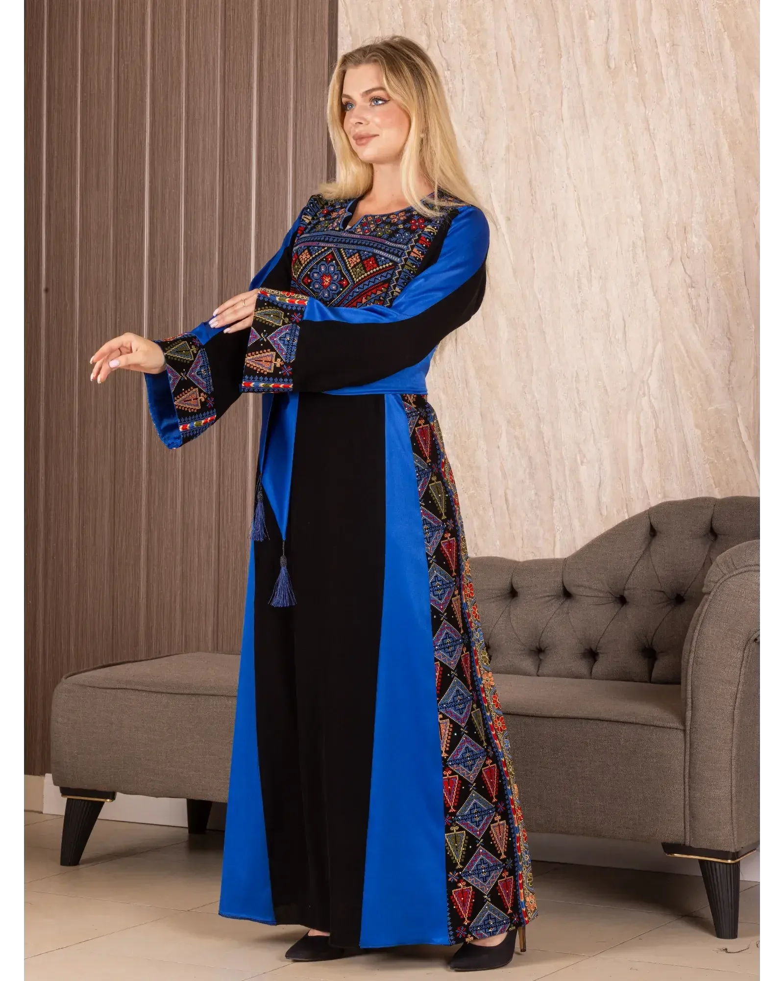 Palestinian embroidered thoub by Palestinian Elegance in black and blue with colorful embroidery details