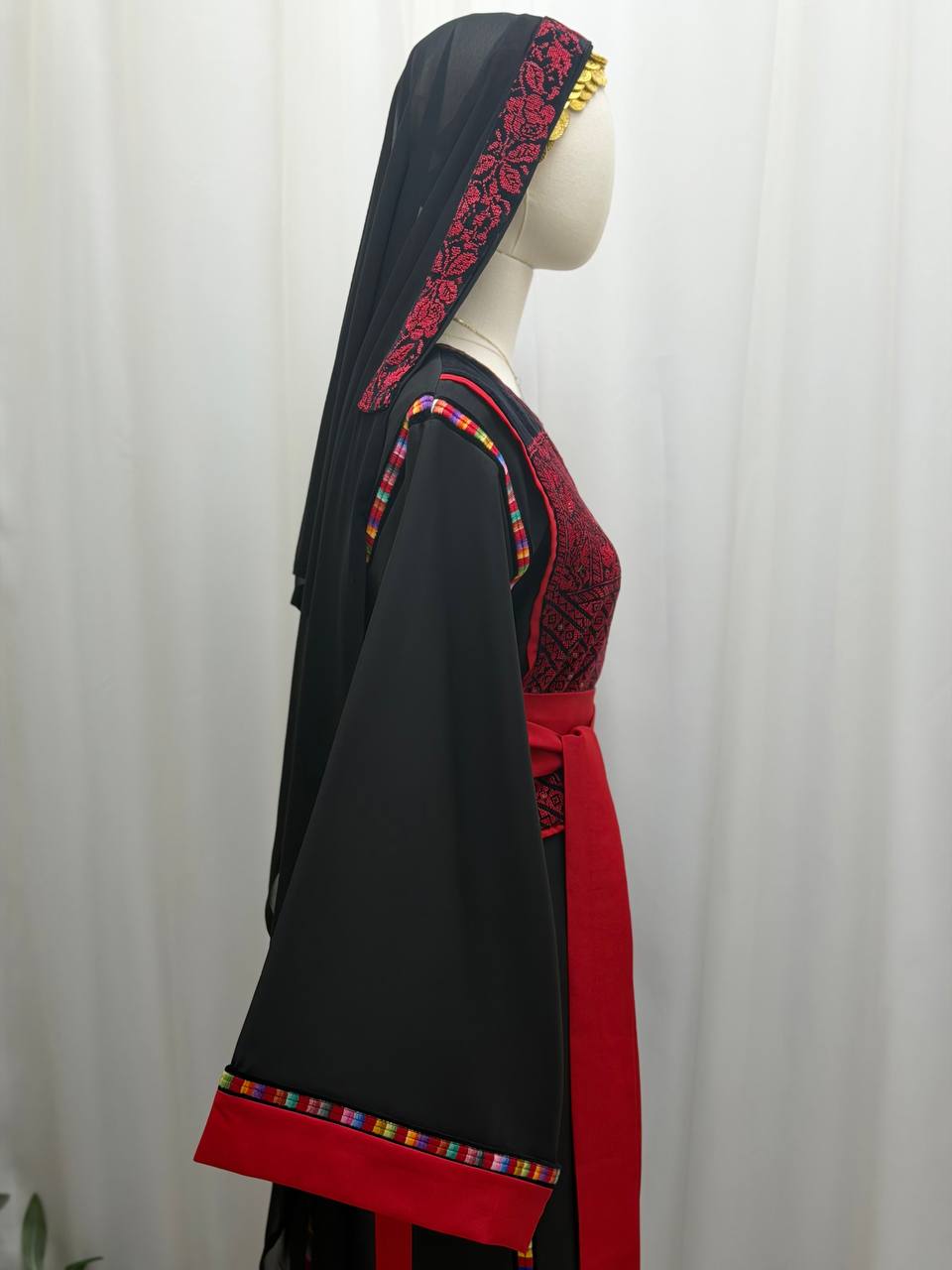 Thobe Al-Yaqout Al-Ahmar (The Red Ruby Thobe)