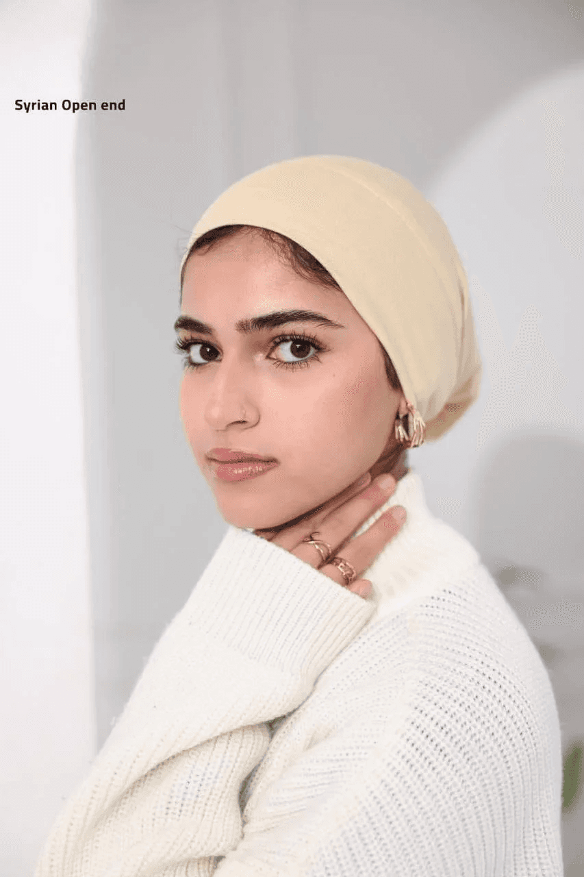Palestinian Elegance Syrian-Style Open Bonnet in beige worn by woman with white sweater