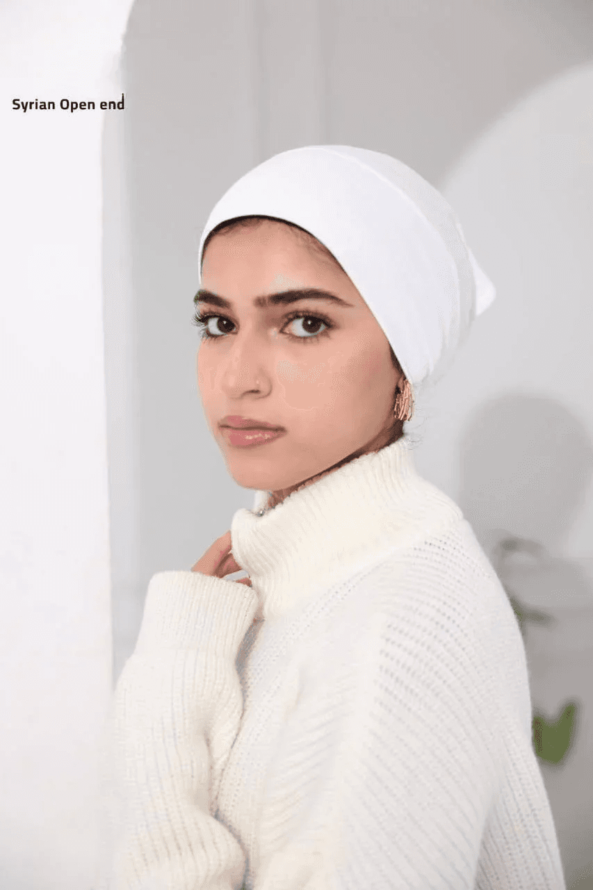 Palestinian Elegance white Syrian-Style Open Bonnet worn by woman with white sweater indoors