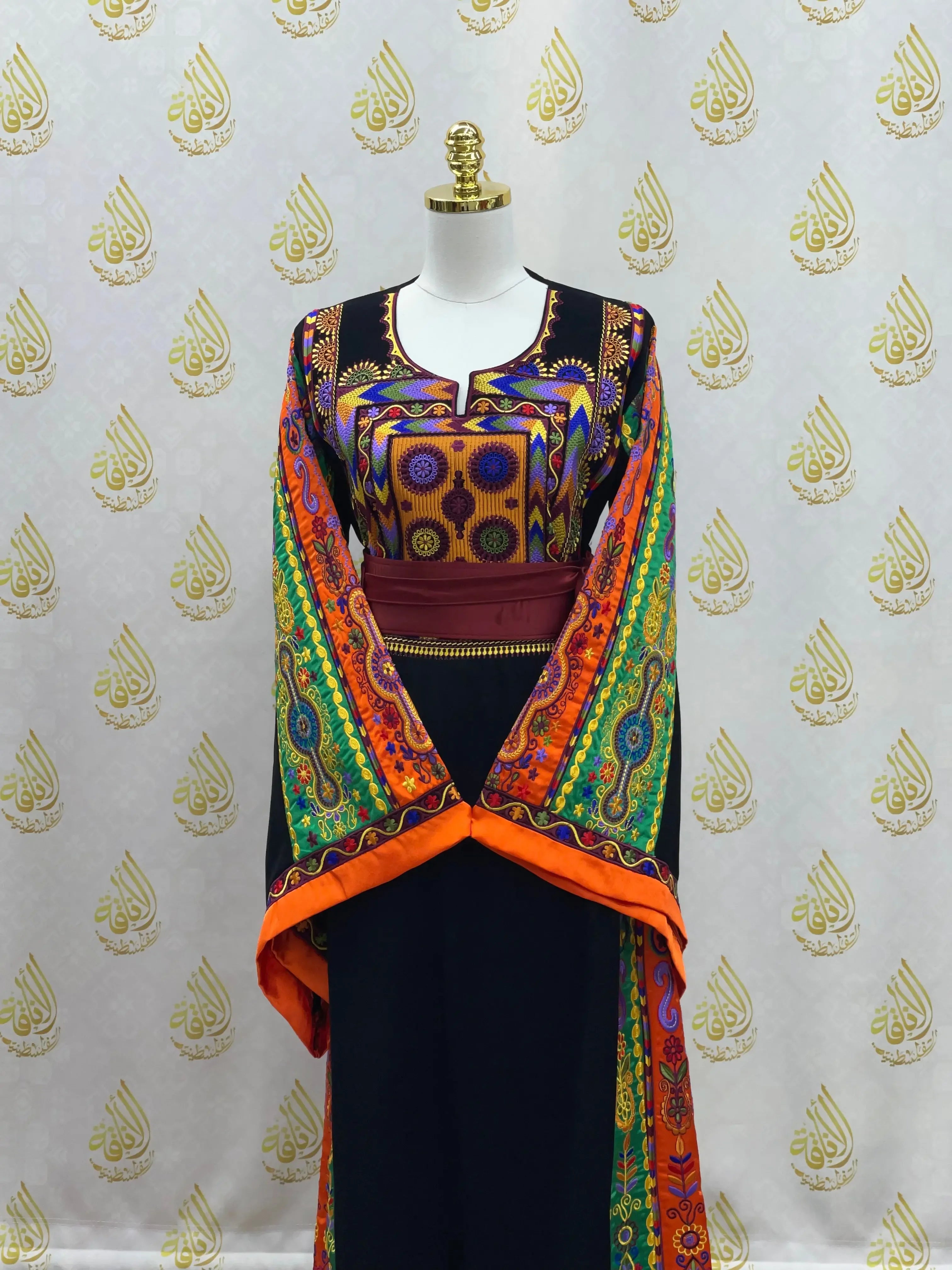 Palestinian Elegance colorful traditional embroidered dress with intricate patterns and wide sleeves
